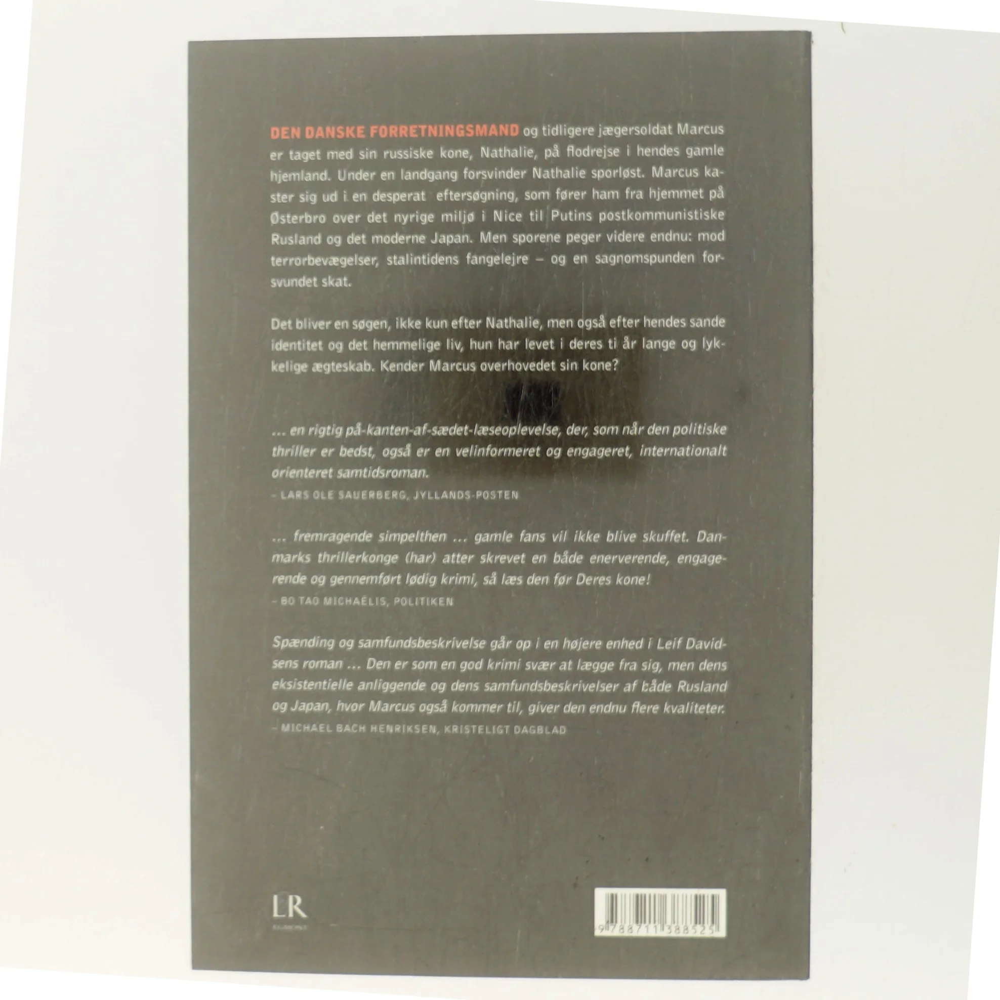 Den ukendte hustru : roman af Leif Davidsen (Bog)