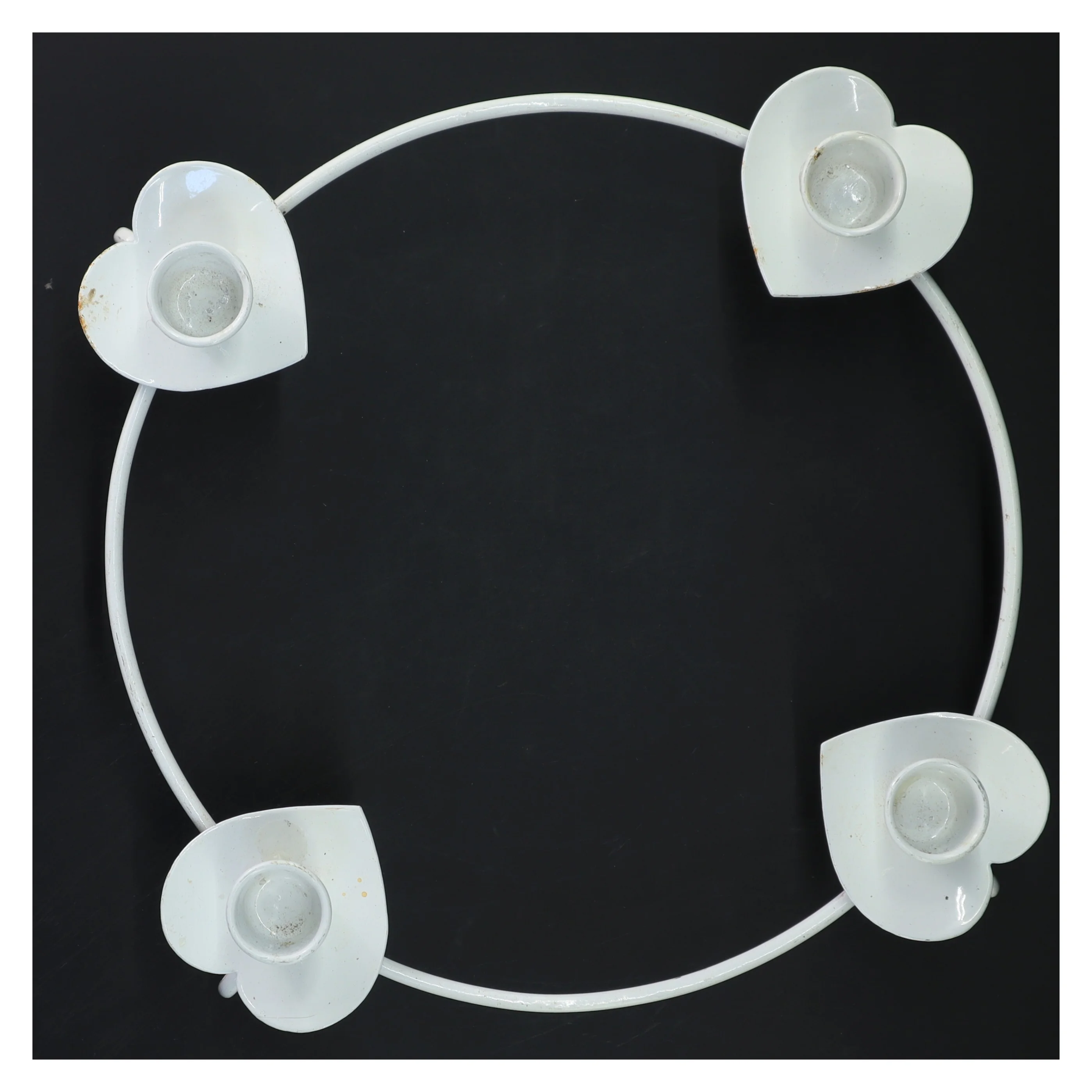 Rund lysestage til fire lys (str. Ø 25x8 cm)