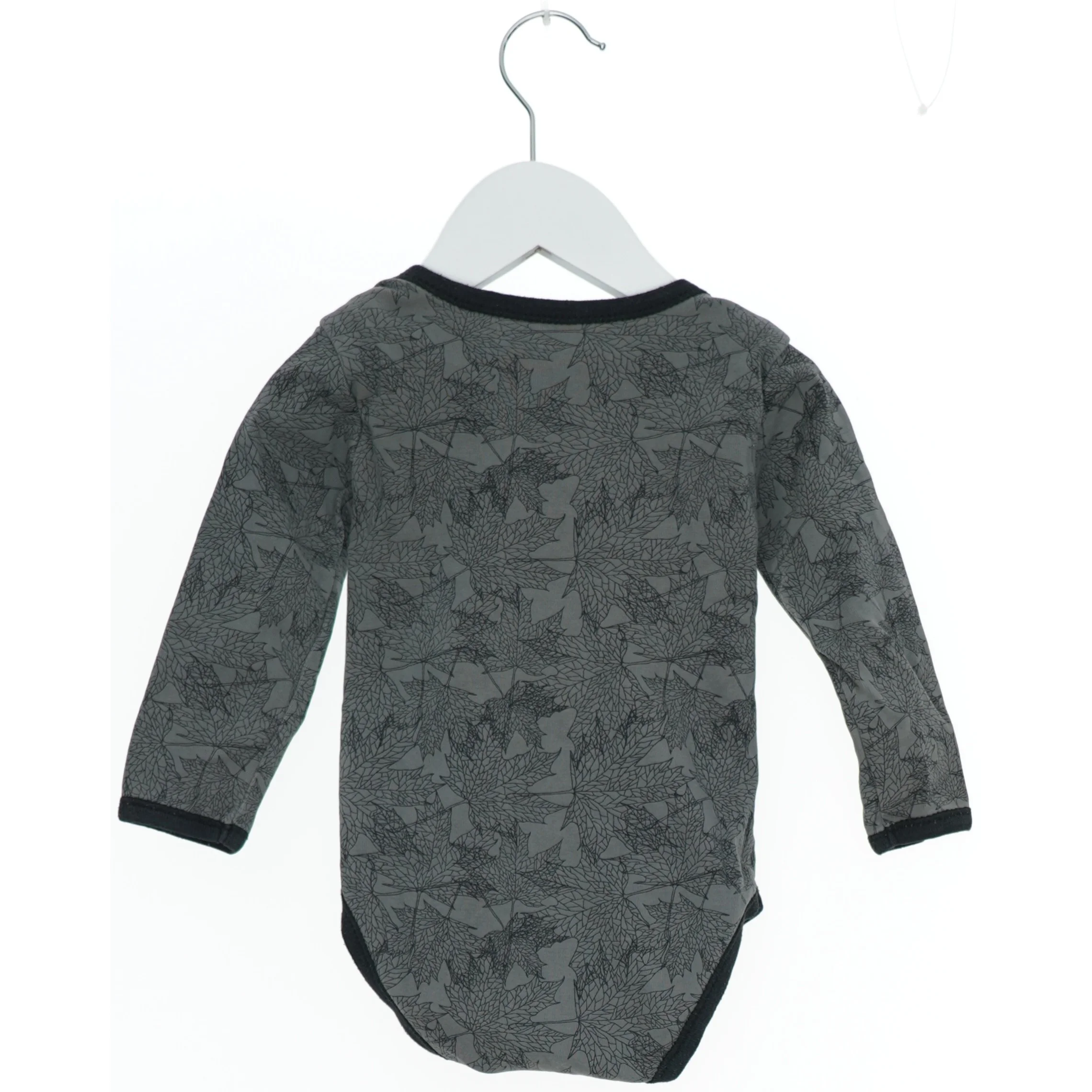 Langærmet bodystocking med bladmønster fra Petit (str. 80)