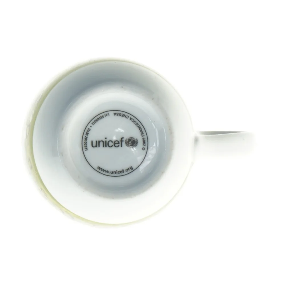 Porcelænskrus med UNICEF motiv fra UNICEF (str. Ø. 8 cm længde. 10 cm)