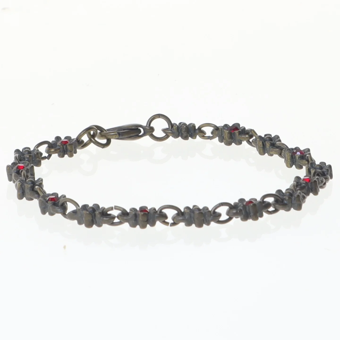 Smykkesæt med rød sten (str. 19 og 43 cm)