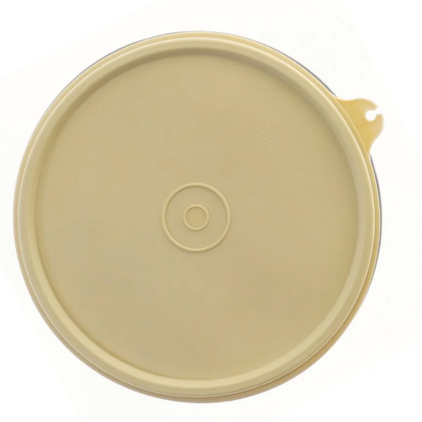 Plastikbeholder med låg fra Tupperware (str. Ø 14 cm længde 10,5 cm)