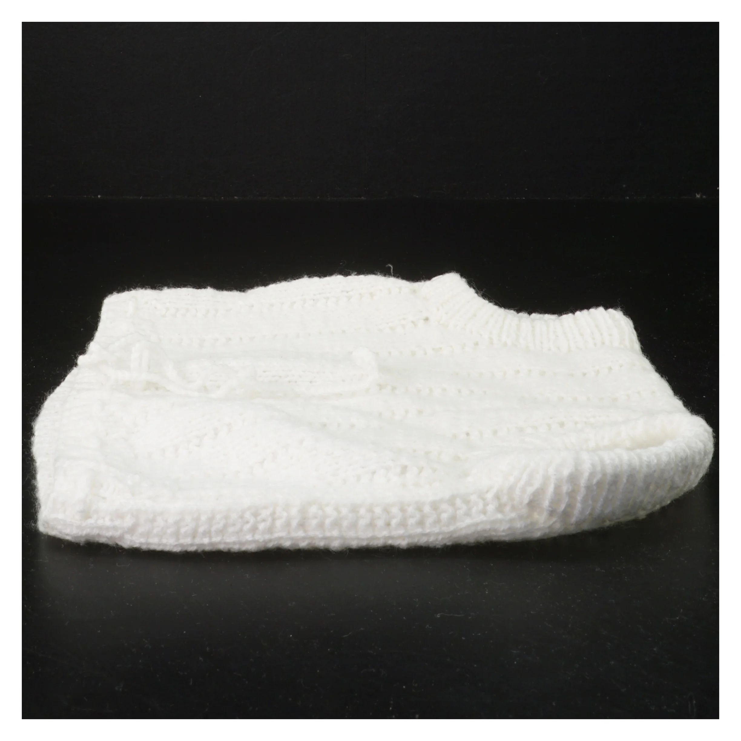 Strikket babyblebuks (str. 25x24 cm)