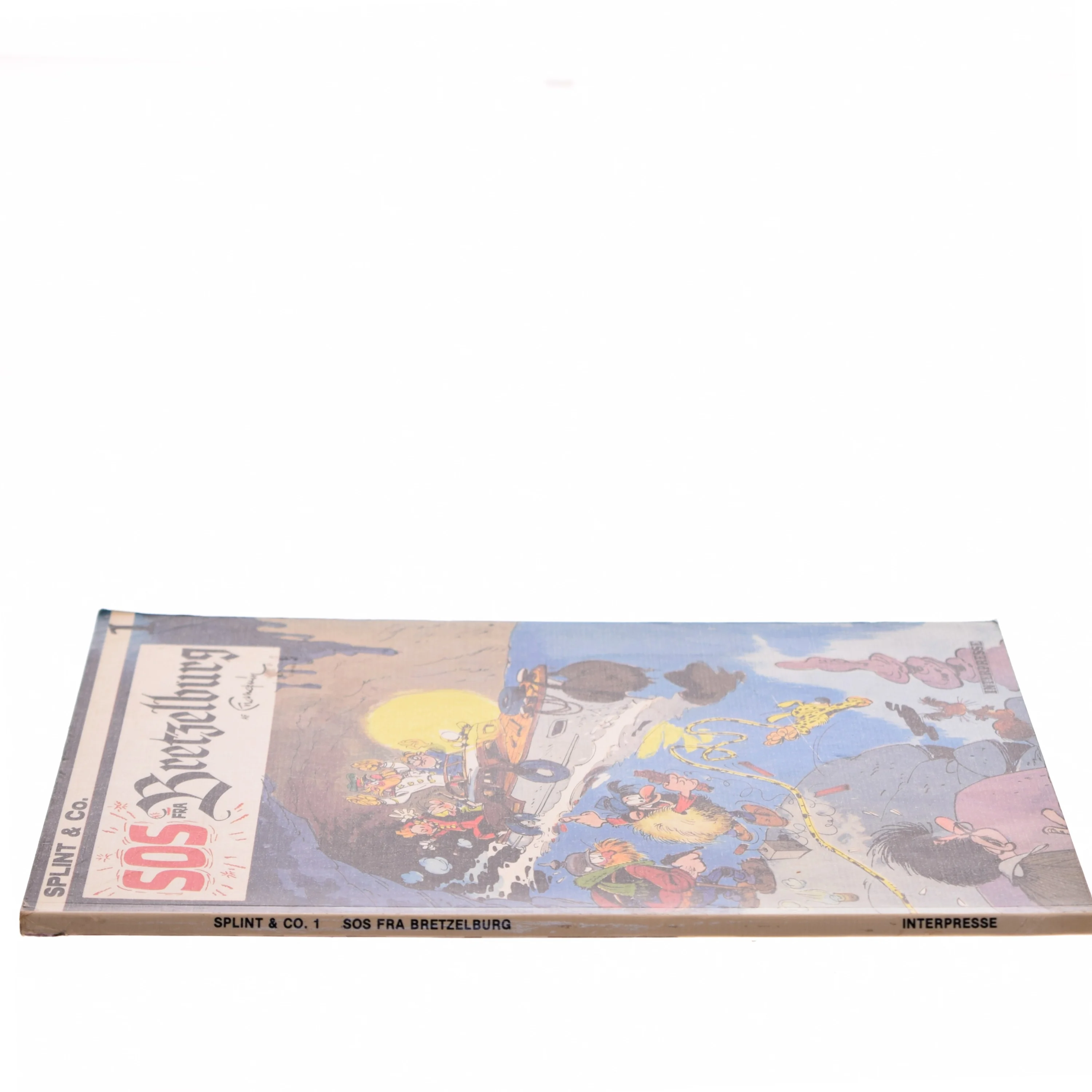 SOS fra Bretzelburg af Franquin (Bog)