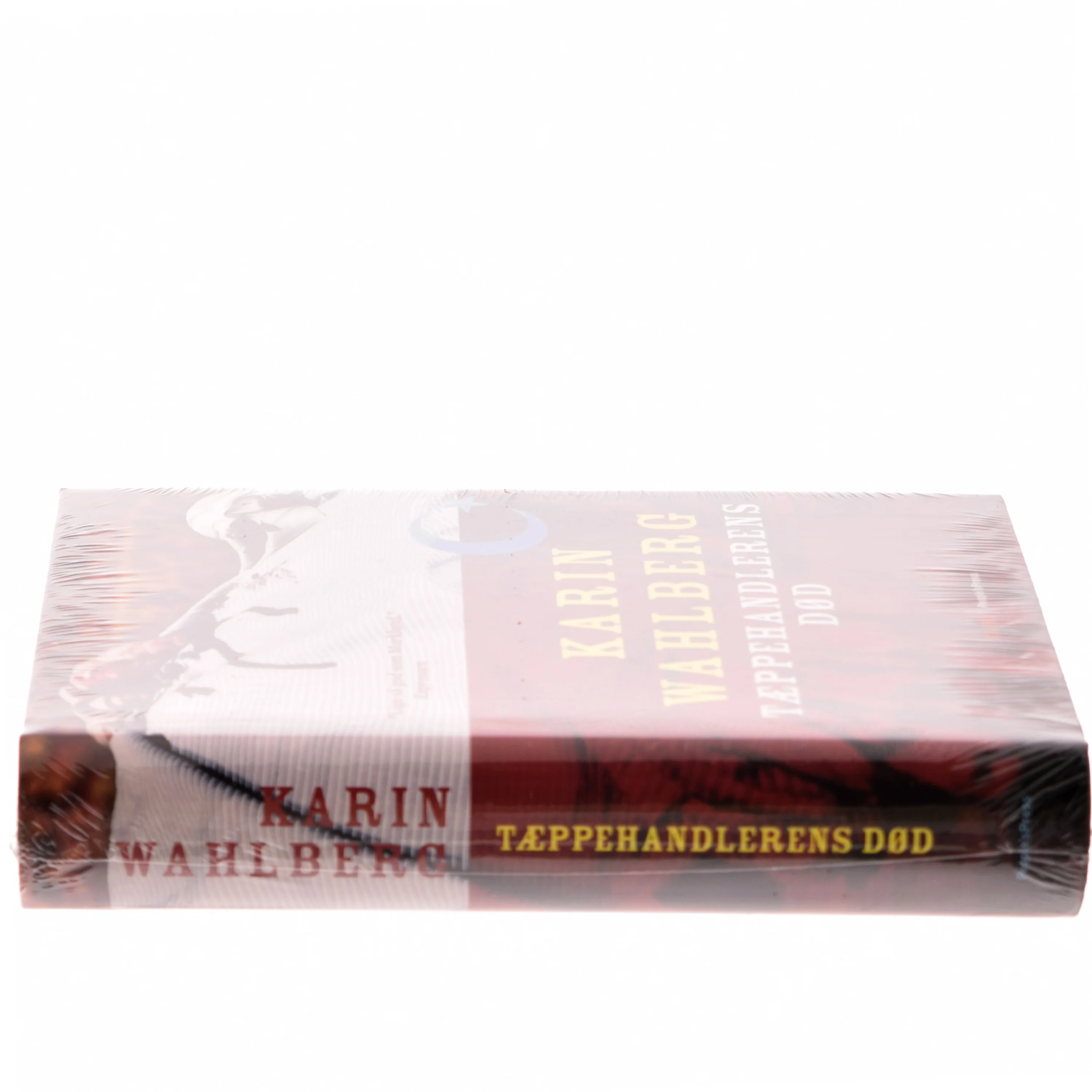 Tæppehandlerens død : kriminalroman af Karin Wahlberg (Bog)