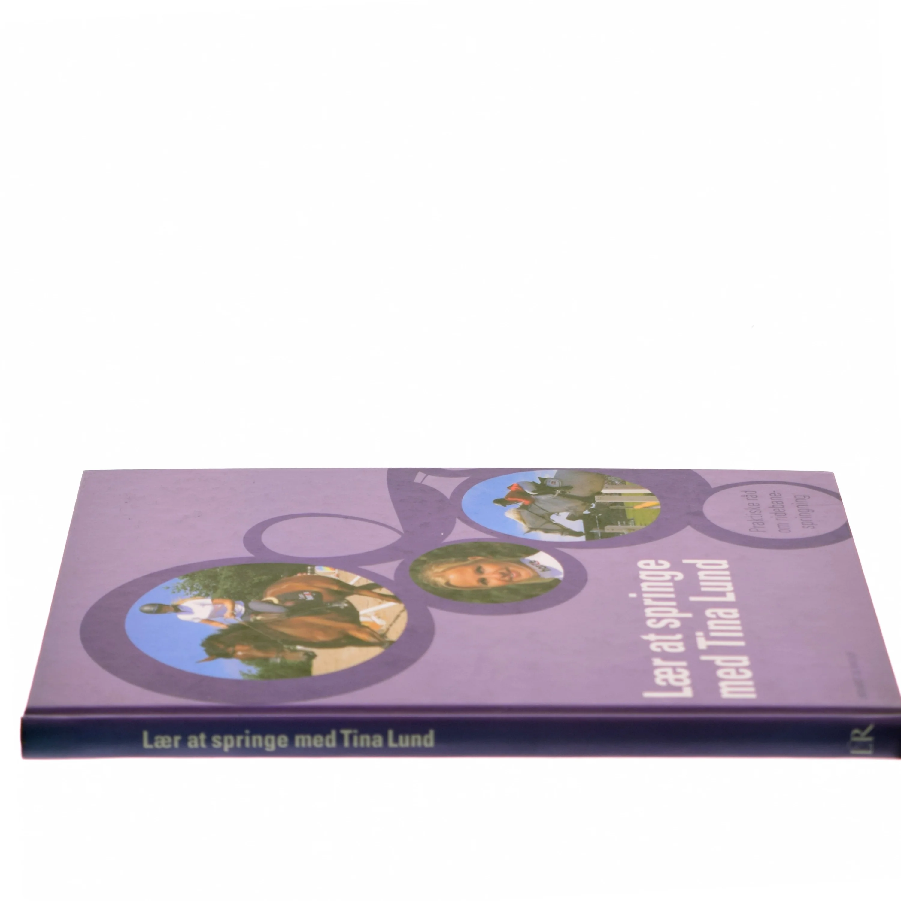 Lær at springe med Tina Lund : praktiske råd om ridebanespringning af Tina Lund (Bog)