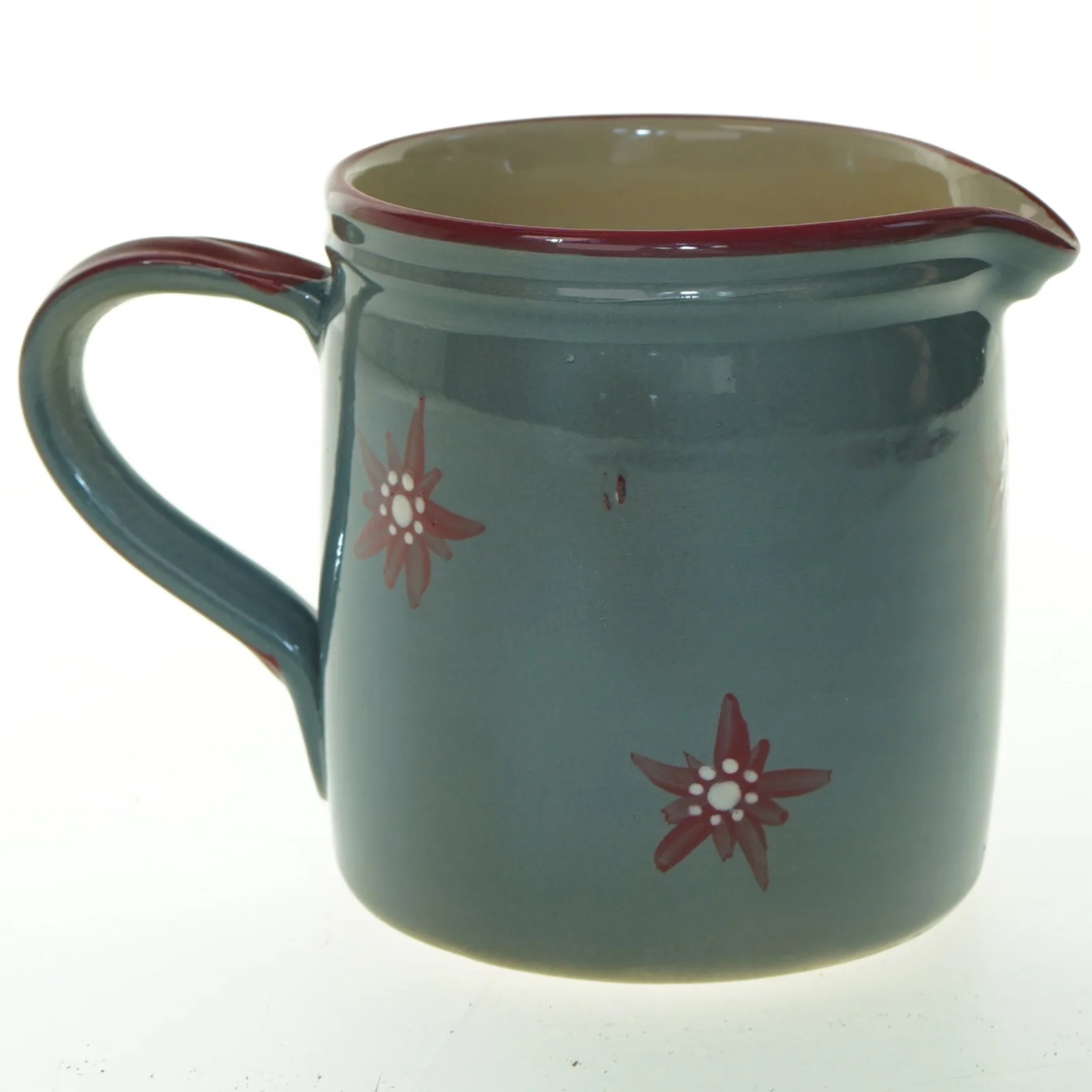 Kande med blomstermotiv (str. 14 cm)