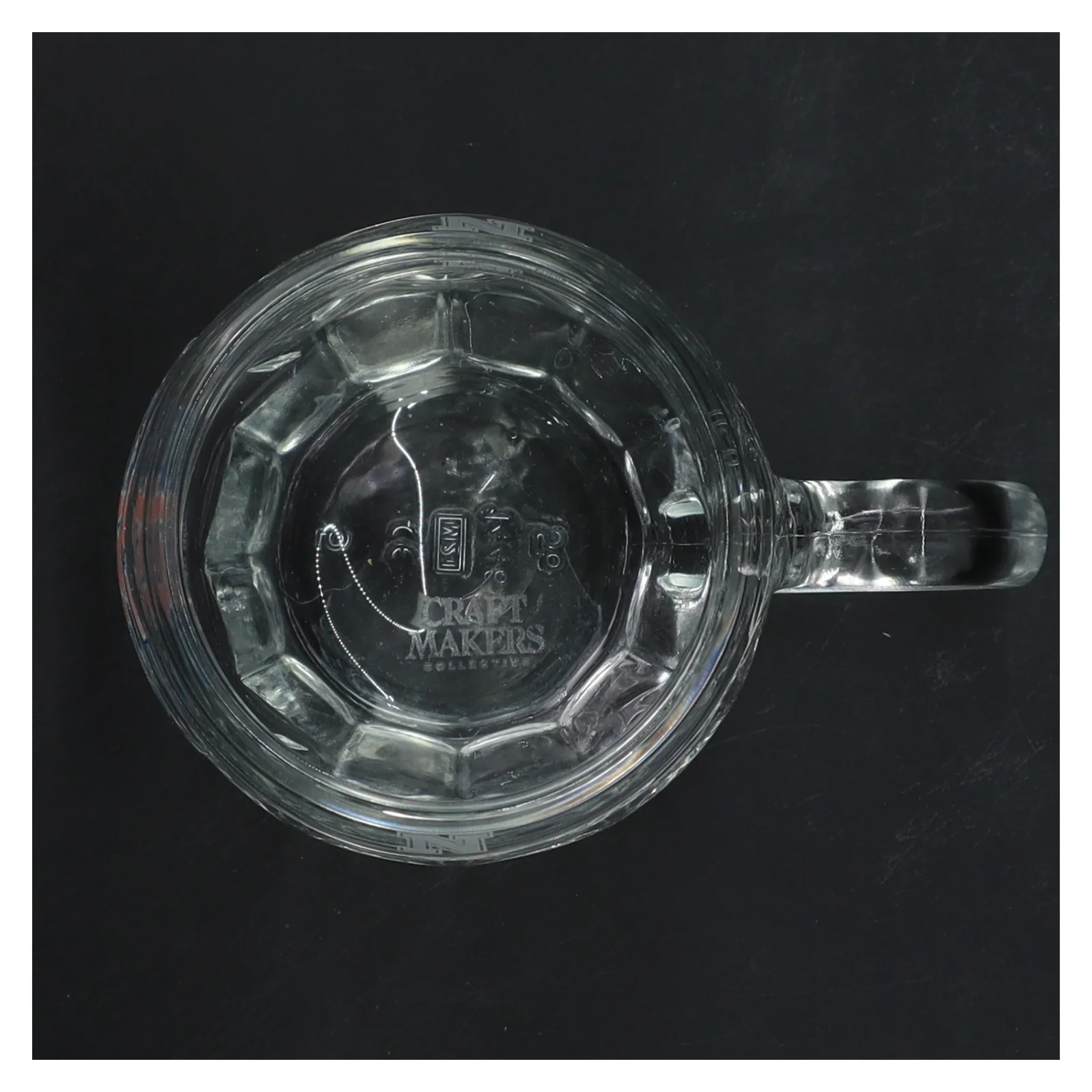 Ølkrus med Natholdet logo (str. Ø 8,5 cm længde 11,5 cm)