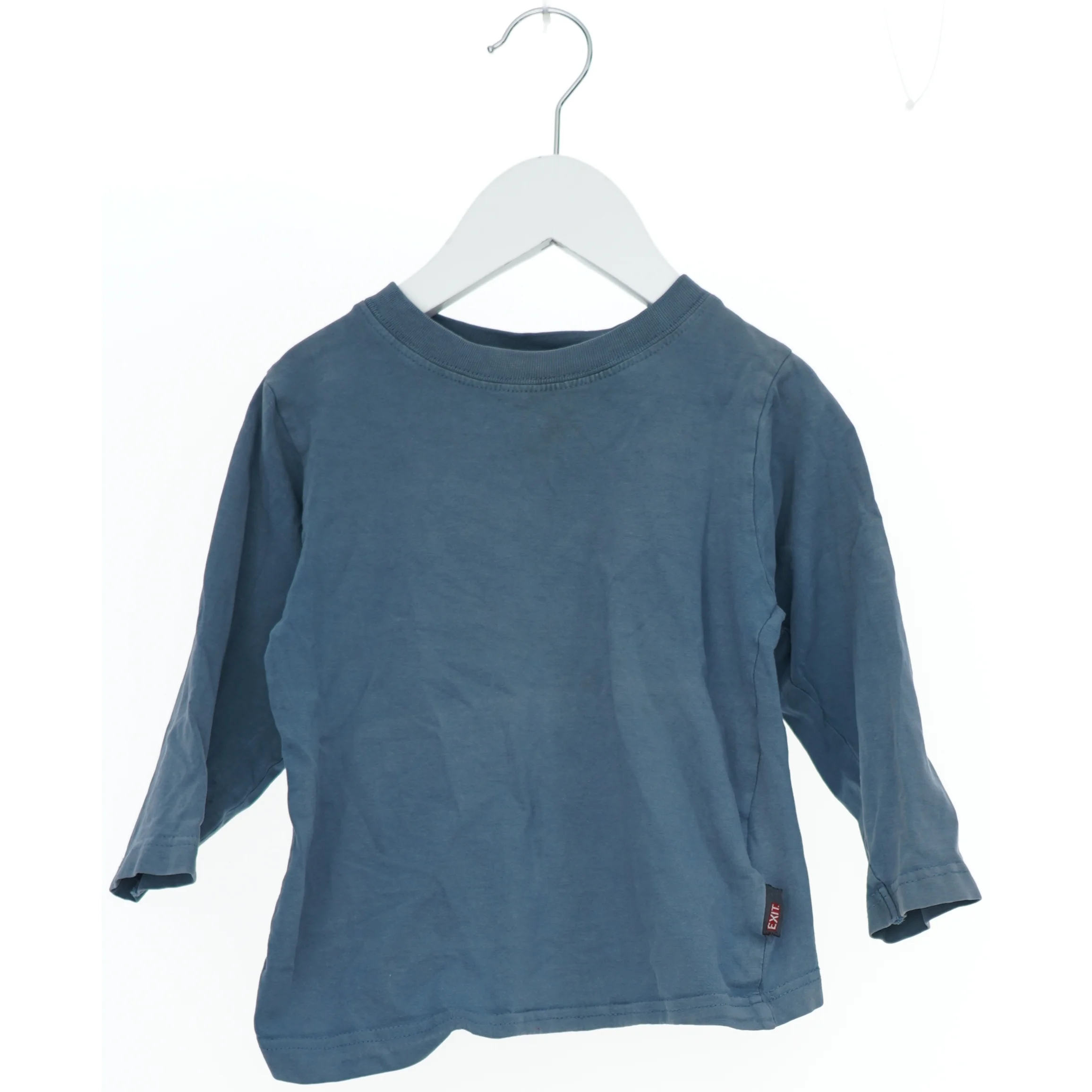 Langærmet blå bluse fra Exit (str. 92)