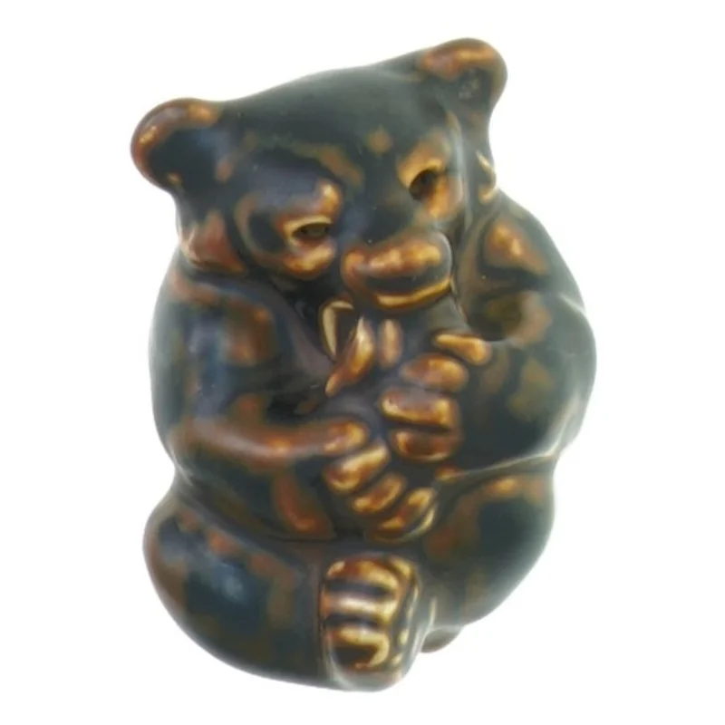 Liggende bjørn med fod i mund fra Royal Copenhagen (str. 8 x 5 cm)
