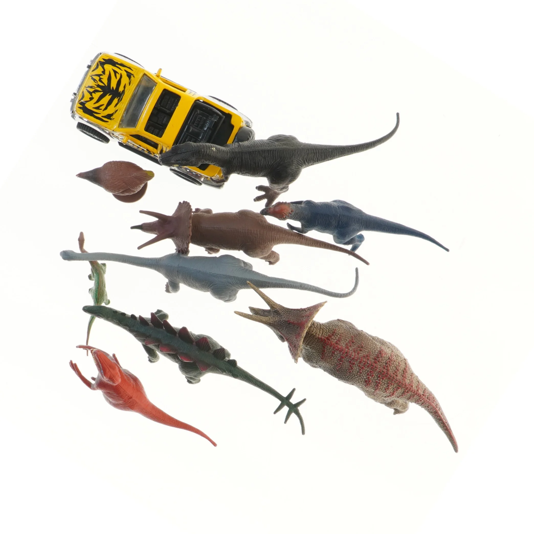Legetøjsdinosaurer og legetøjsbil (str. ca 11-23 cm)