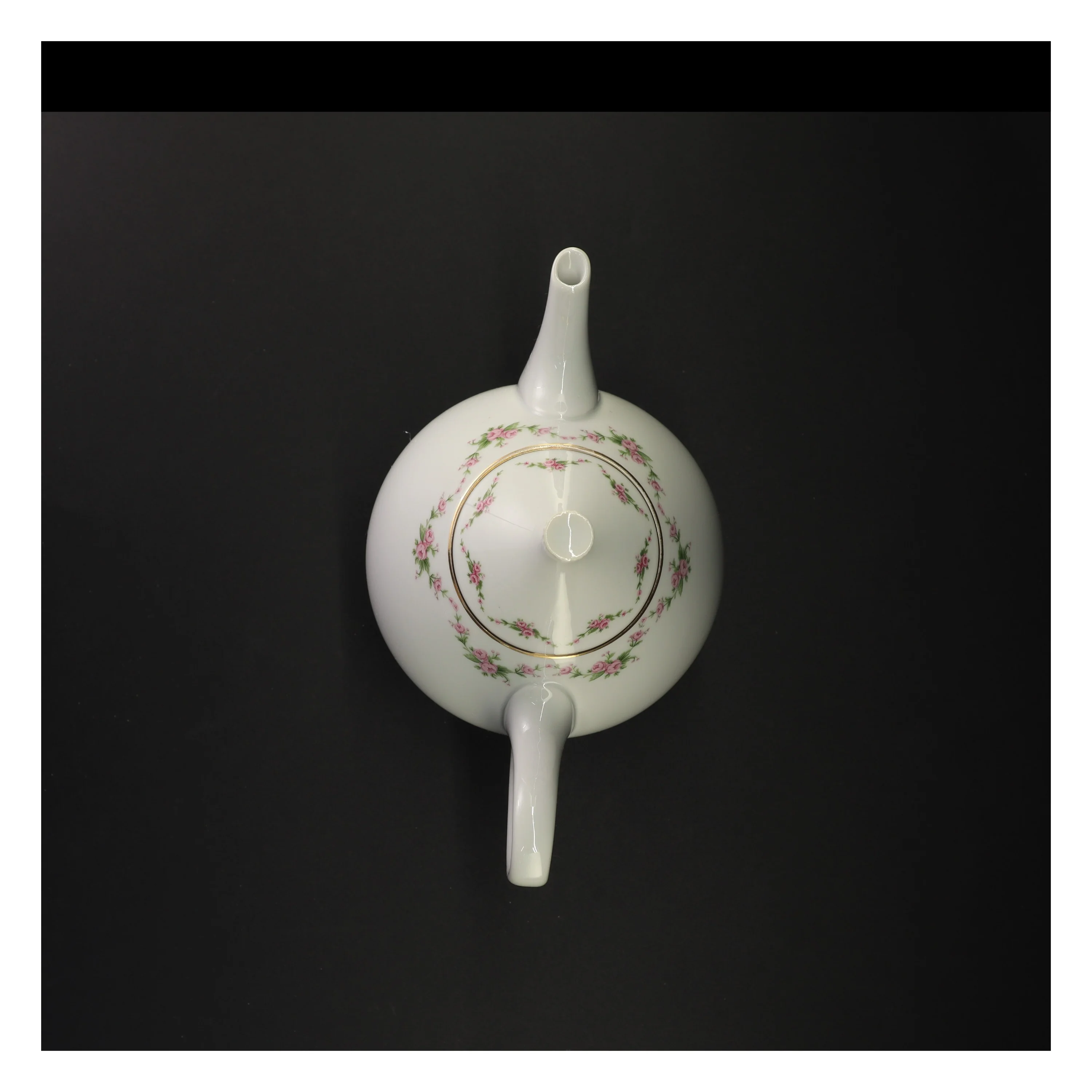 Porcelæn tekande med blomstermotiv fra Benedikte (str. 26 x 14 cm)