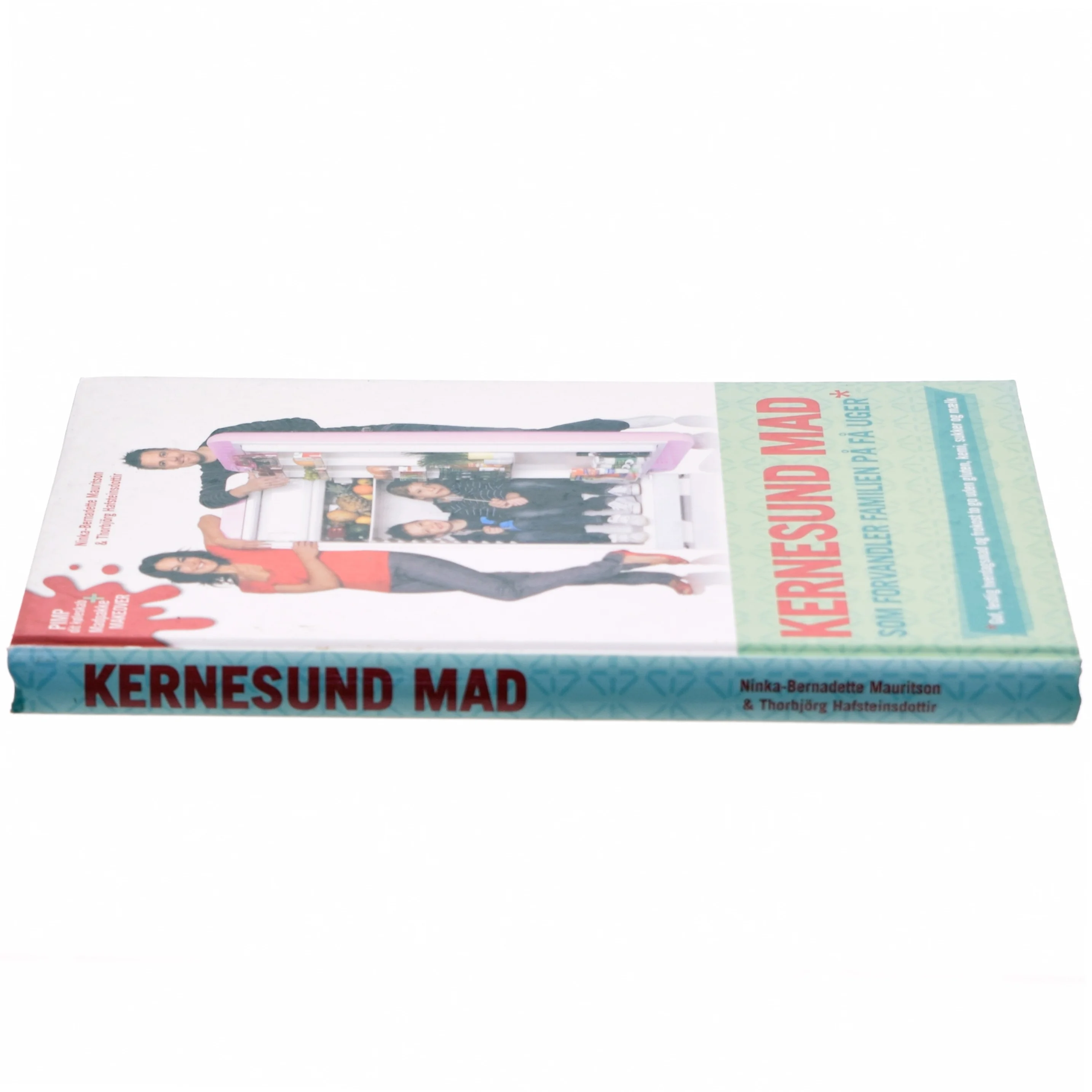 Kernesund mad som forvandler familien på få uger : guf, festlig hverdagsmad og frokost to go uden gluten, kemi, sukker og mælk (Bog)