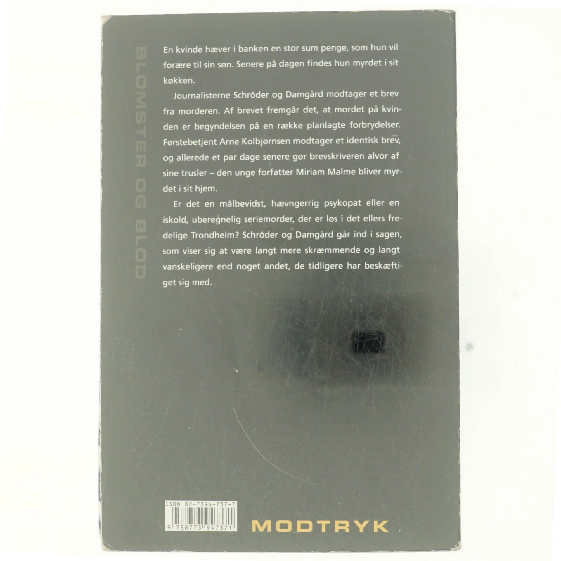 Blomster og blod : roman af Fredrik Skagen (Bog)