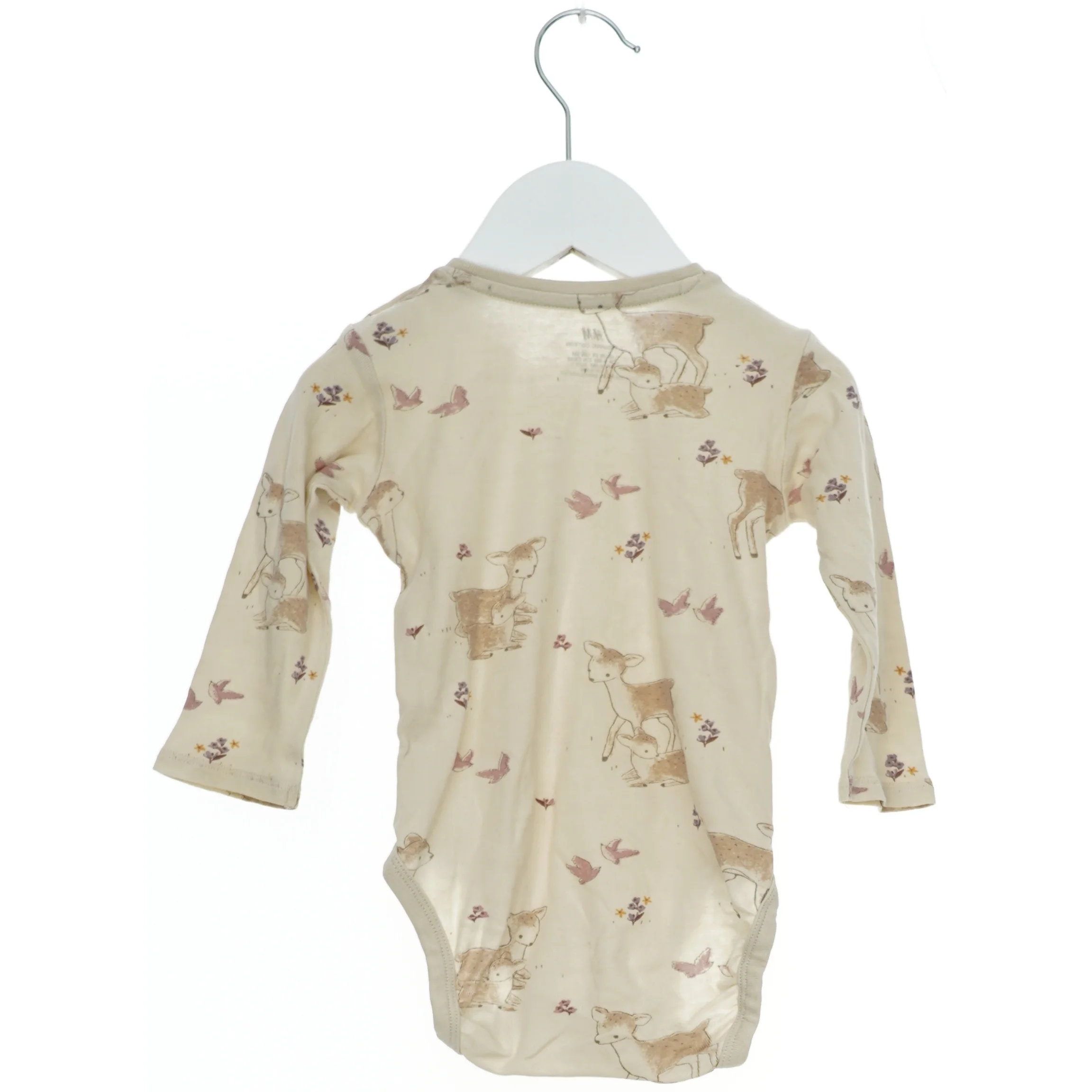 Langærmet bodystocking med dyremotiv fra H&M (str. 74)