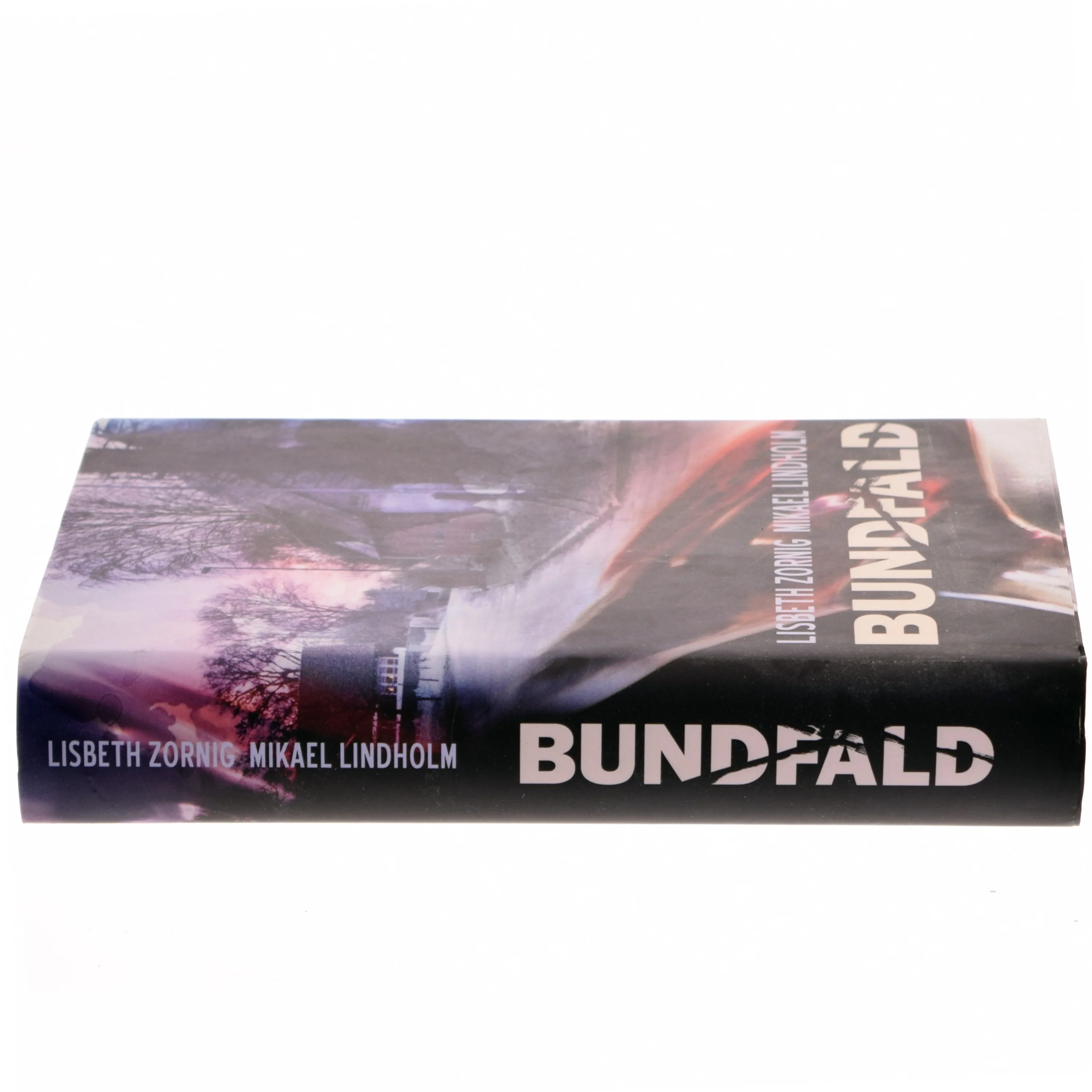 Bundfald : spændingsroman af Mikael R. Lindholm (f. 1961) (Bog)