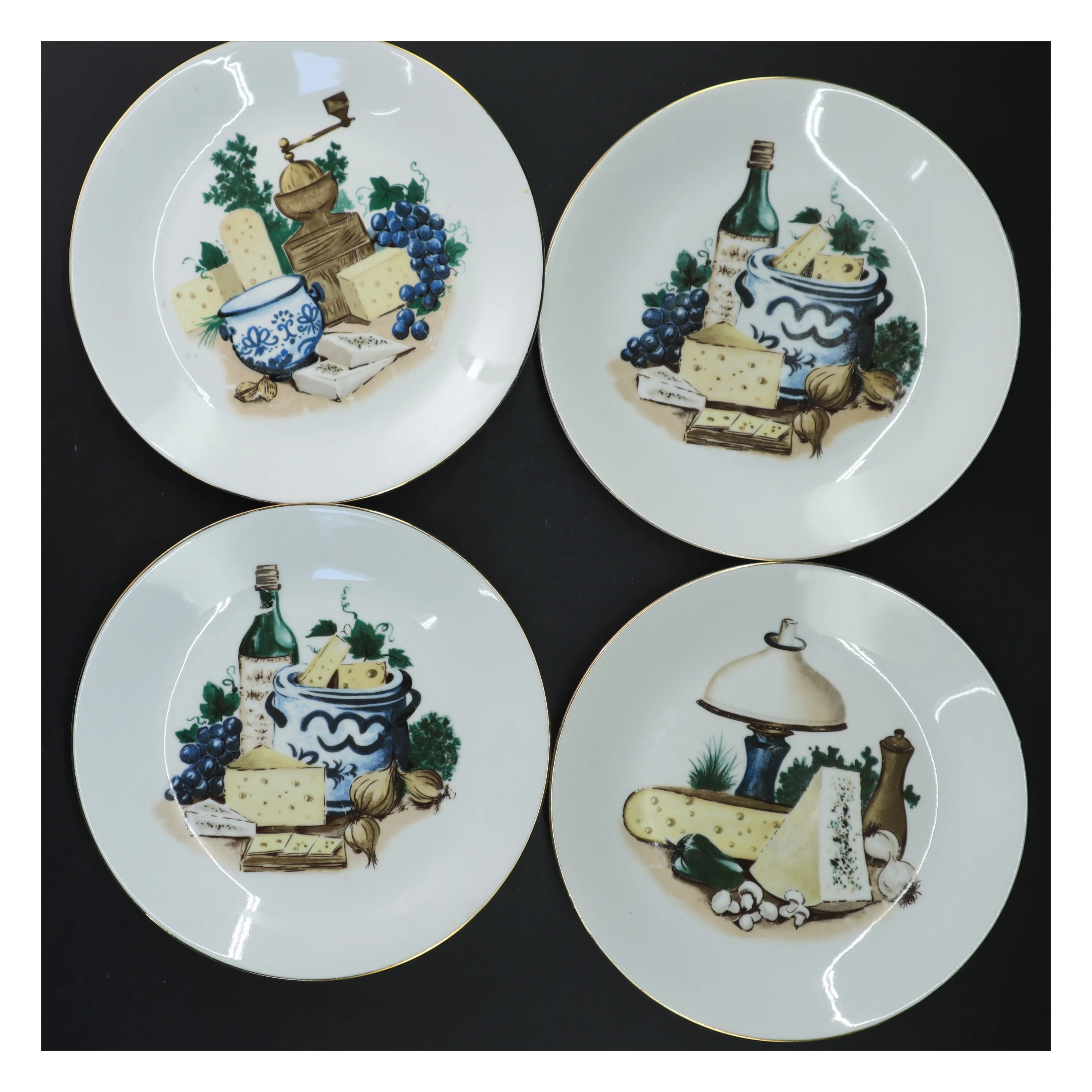 Sæt af dekorative tallerkener med ostemotiv (str. Ø 19 cm)