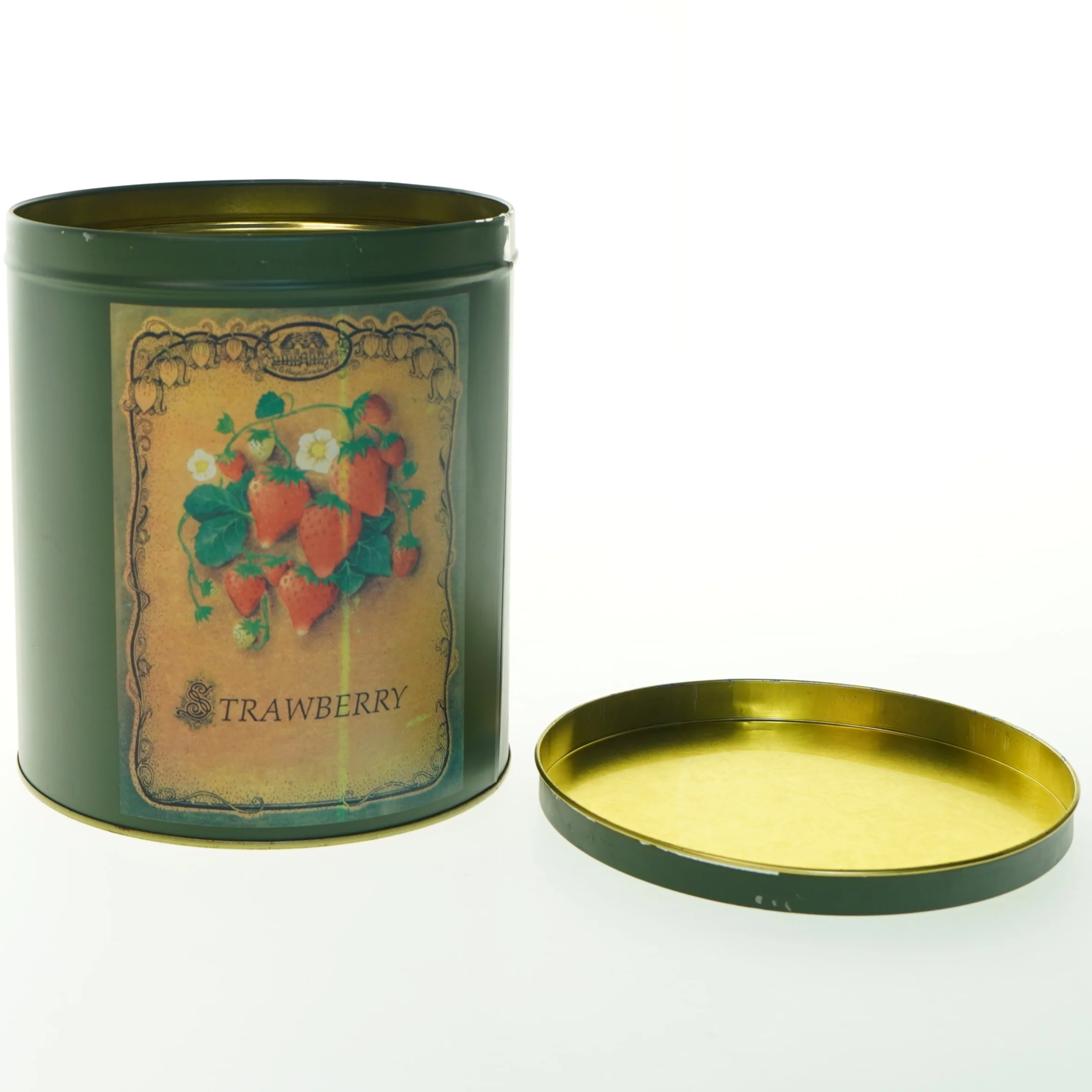 Metaldåse med jordbærmotiv (str. Ø. 17 cm. længde. 20 cm)