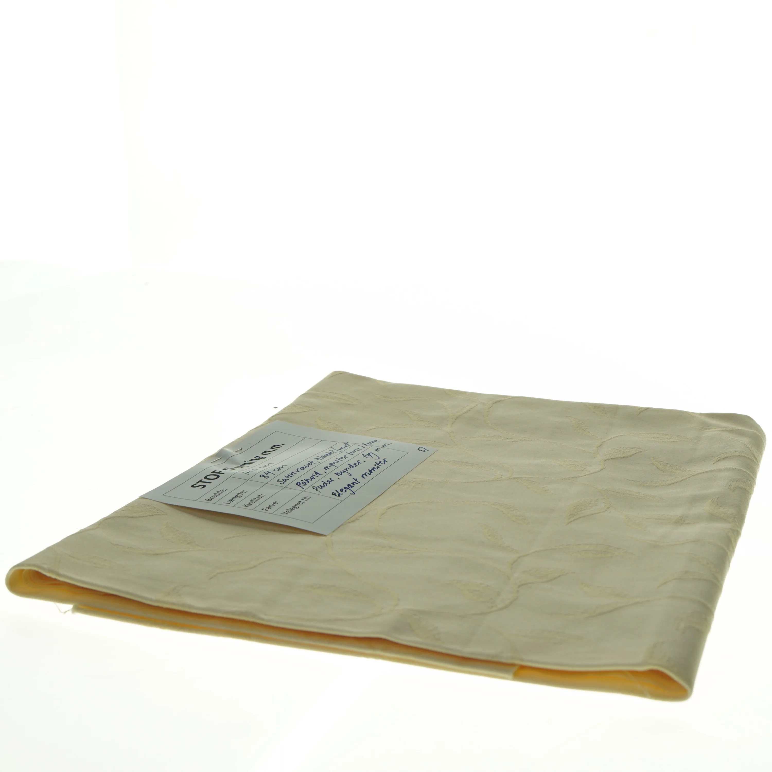 Satinvævet stof med bladmønster (140 x 84 cm)