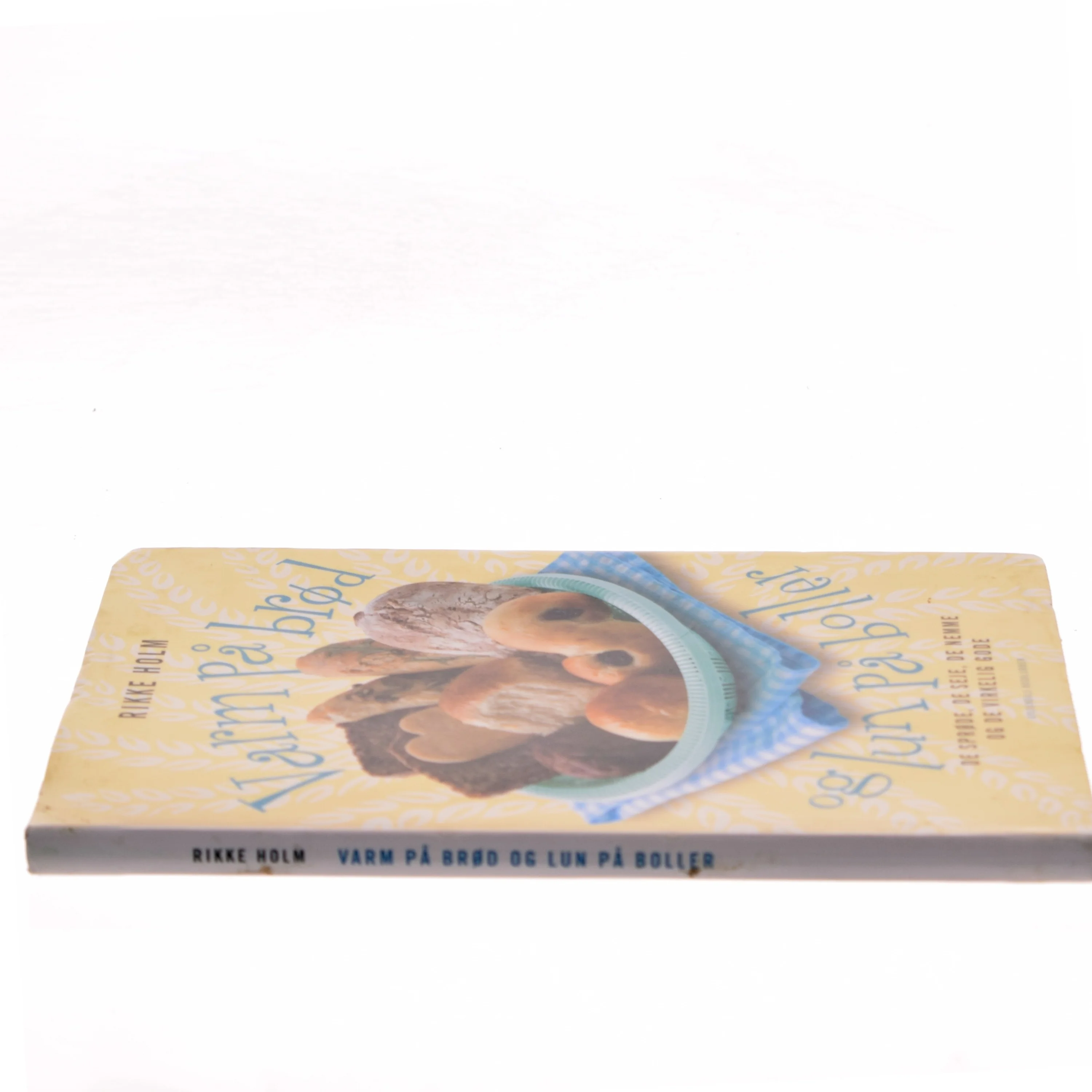 Varm på brød og lun på boller : de sprøde, de seje, de nemme og de virkelig gode : fotos: Maria P. af Rikke Holm (f. 1966-10-14) (Bog)