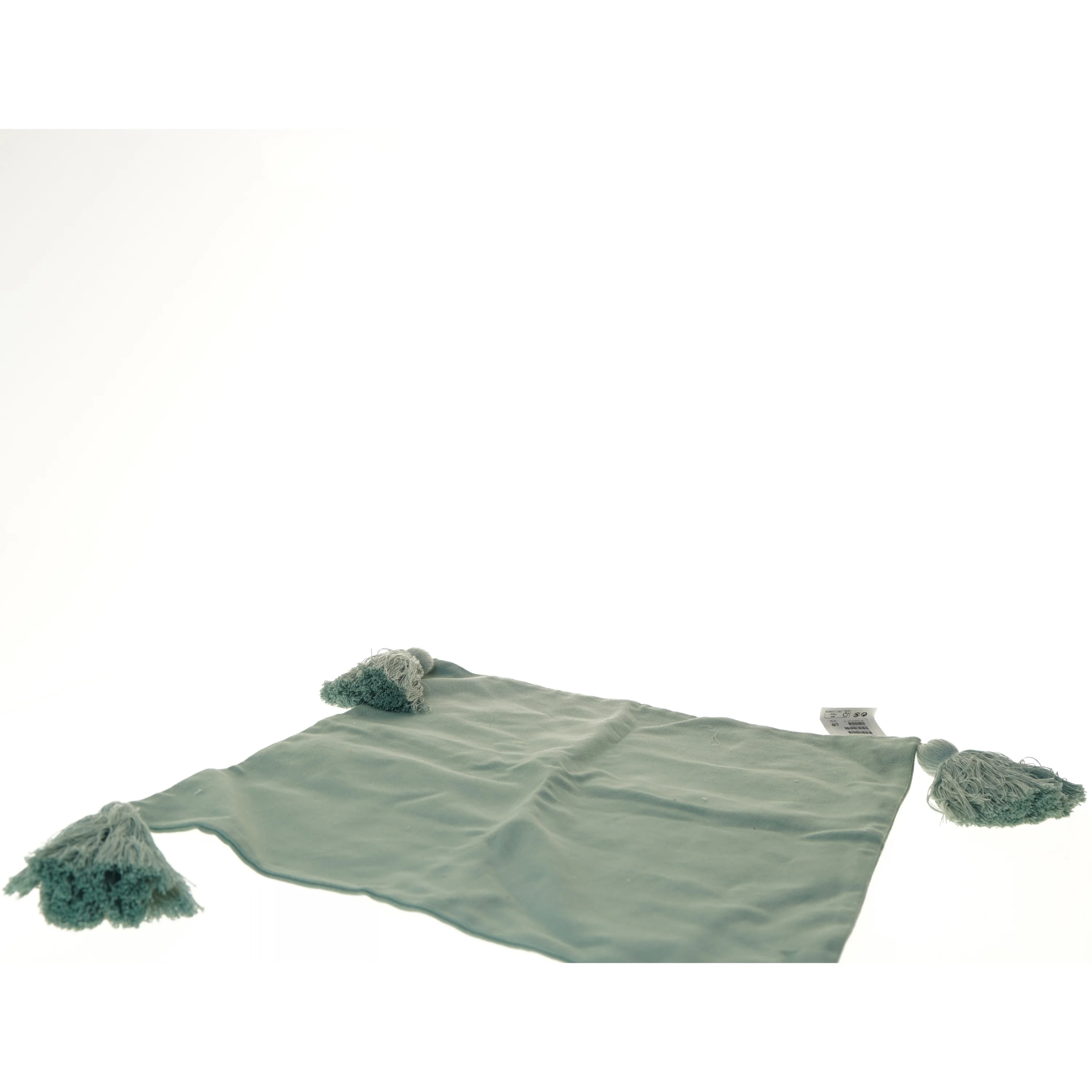 grøn kvadratisk pude med kvaster fra H&M (str. 50x50 cm)