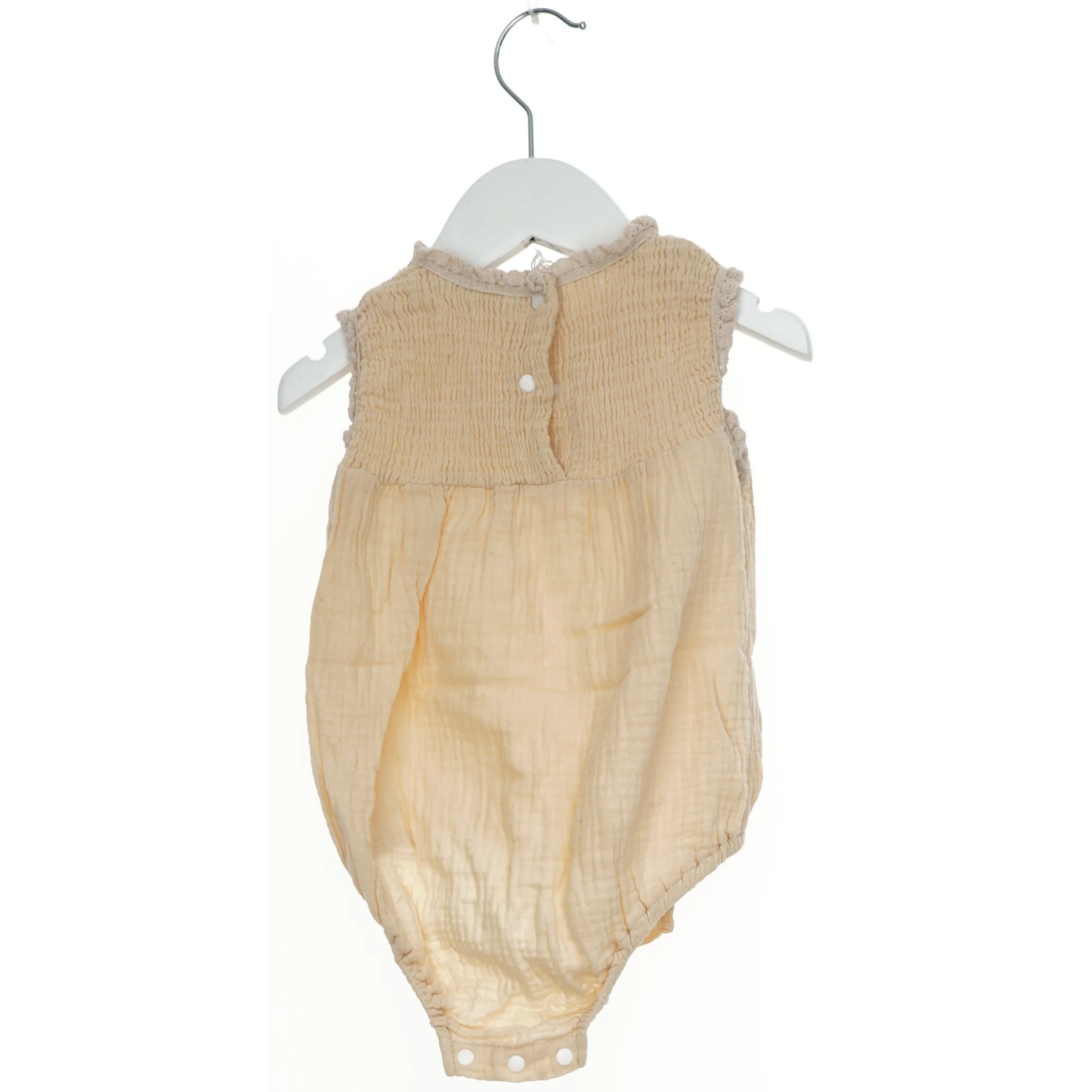 Beige bodystocking til baby fra Memory Life (str. 80)