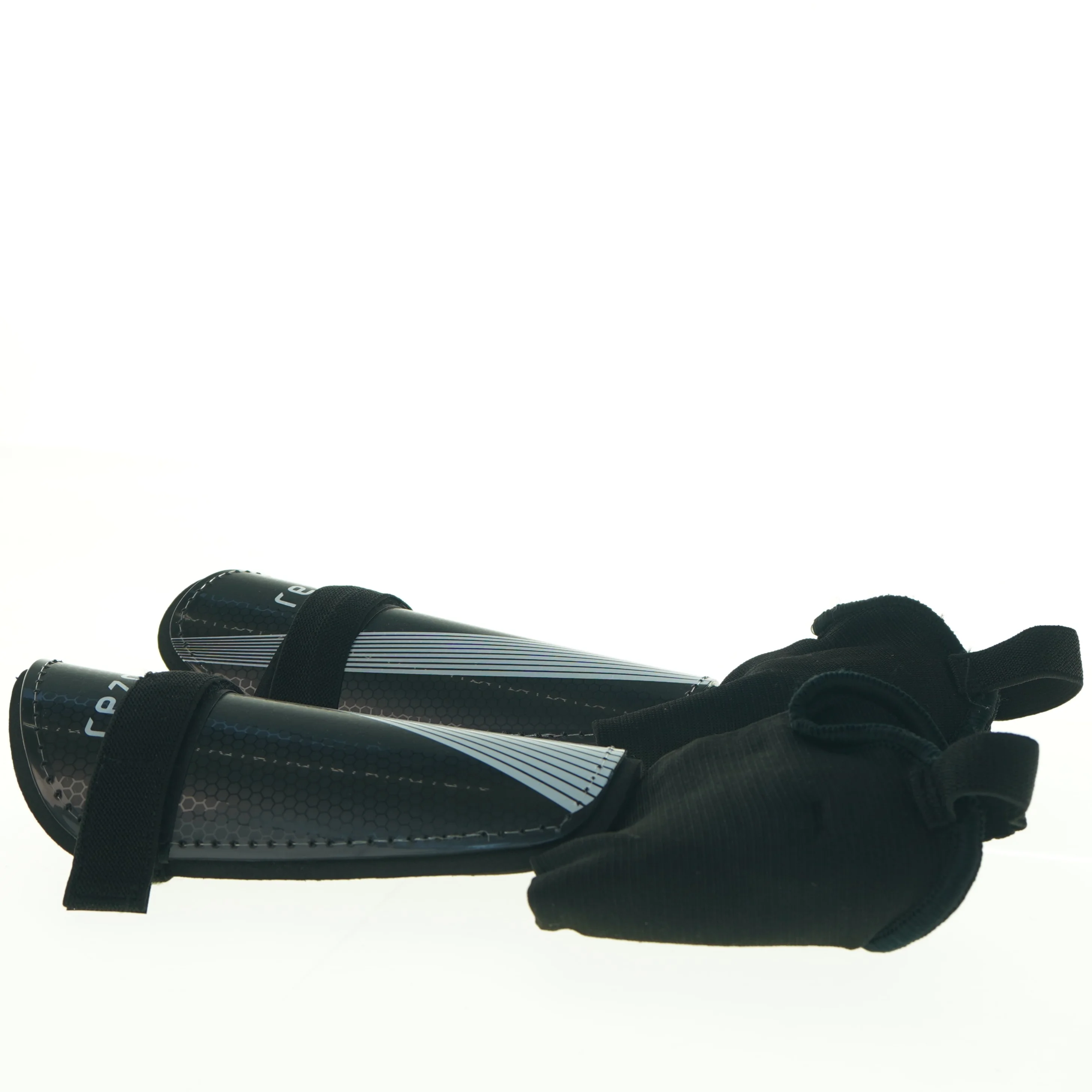 Fodbold benskinner fra Rezo (str. L 22 cm)