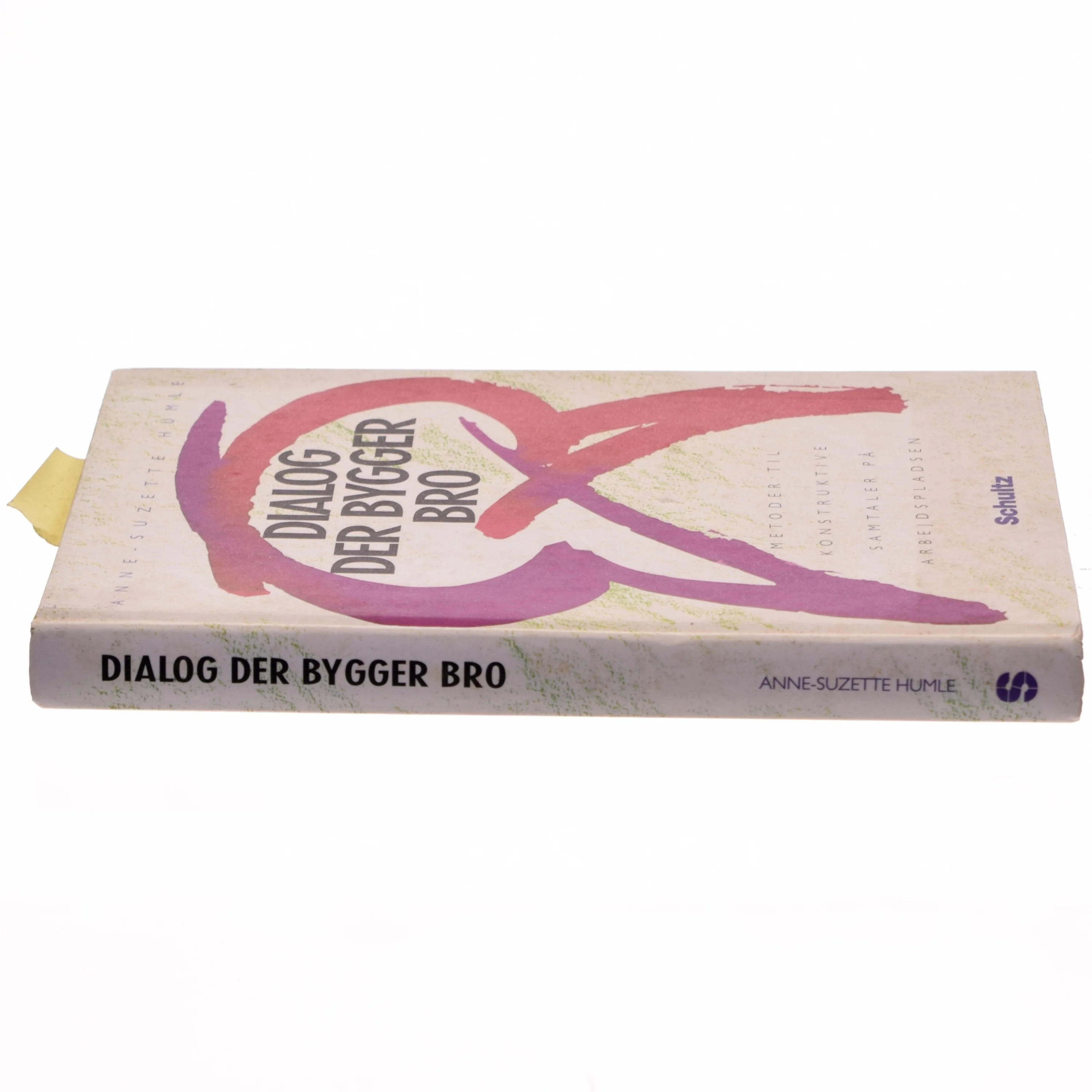 Dialog der bygger bro : metoder til konstruktive samtaler på arbejdspladsen af Susse Humle (Bog)