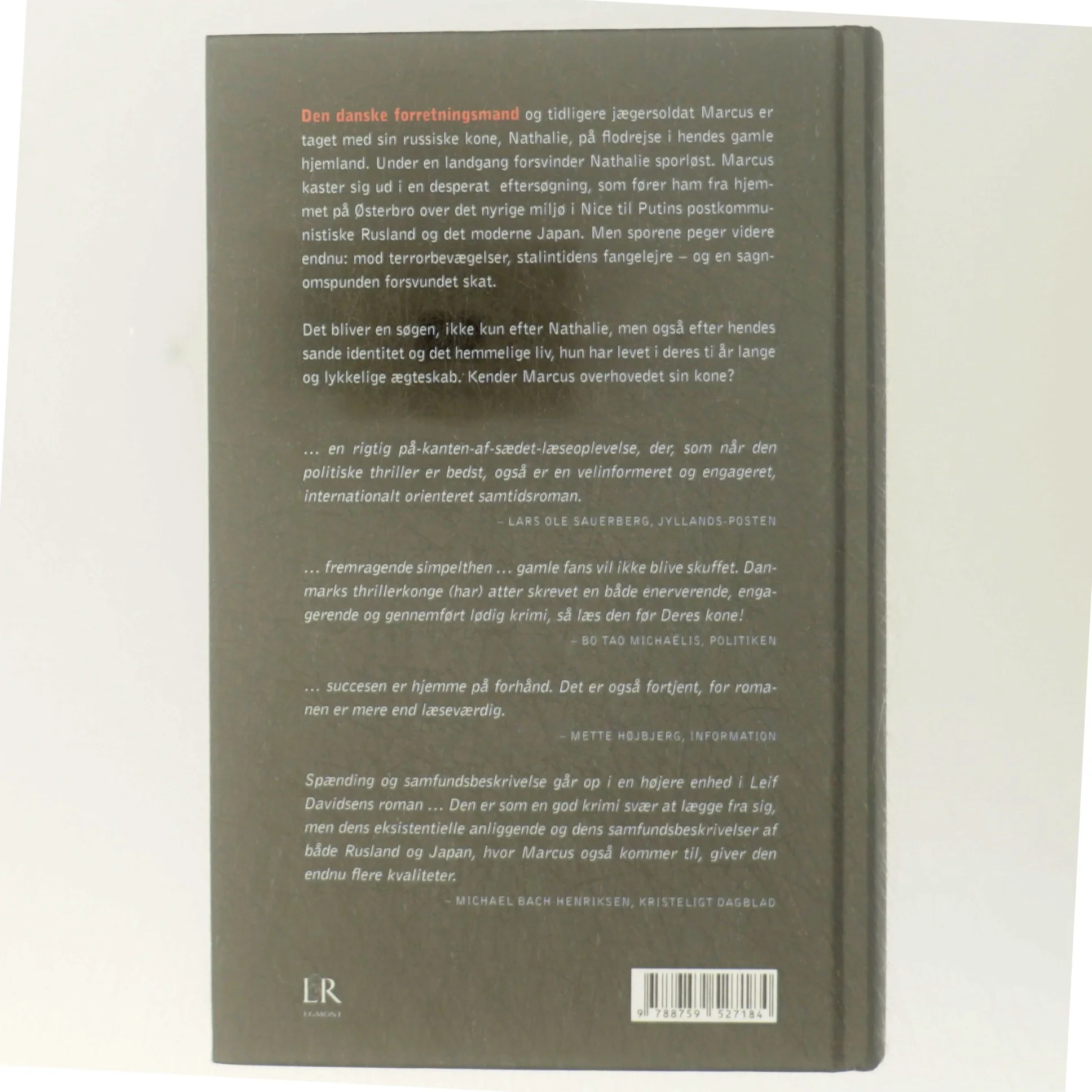 Den ukendte hustru : roman af Leif Davidsen (Bog)