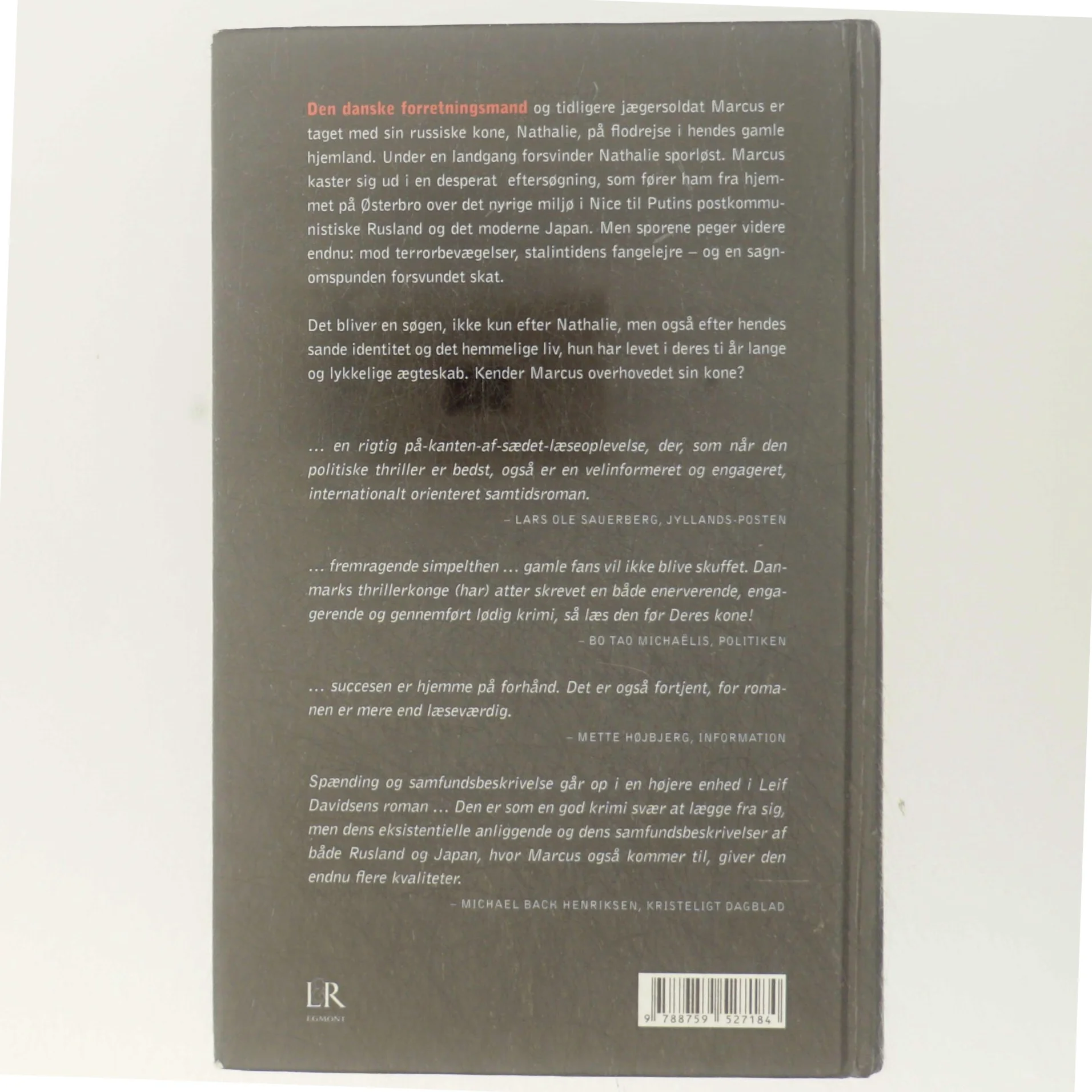 Den ukendte hustru : roman af Leif Davidsen (Bog)