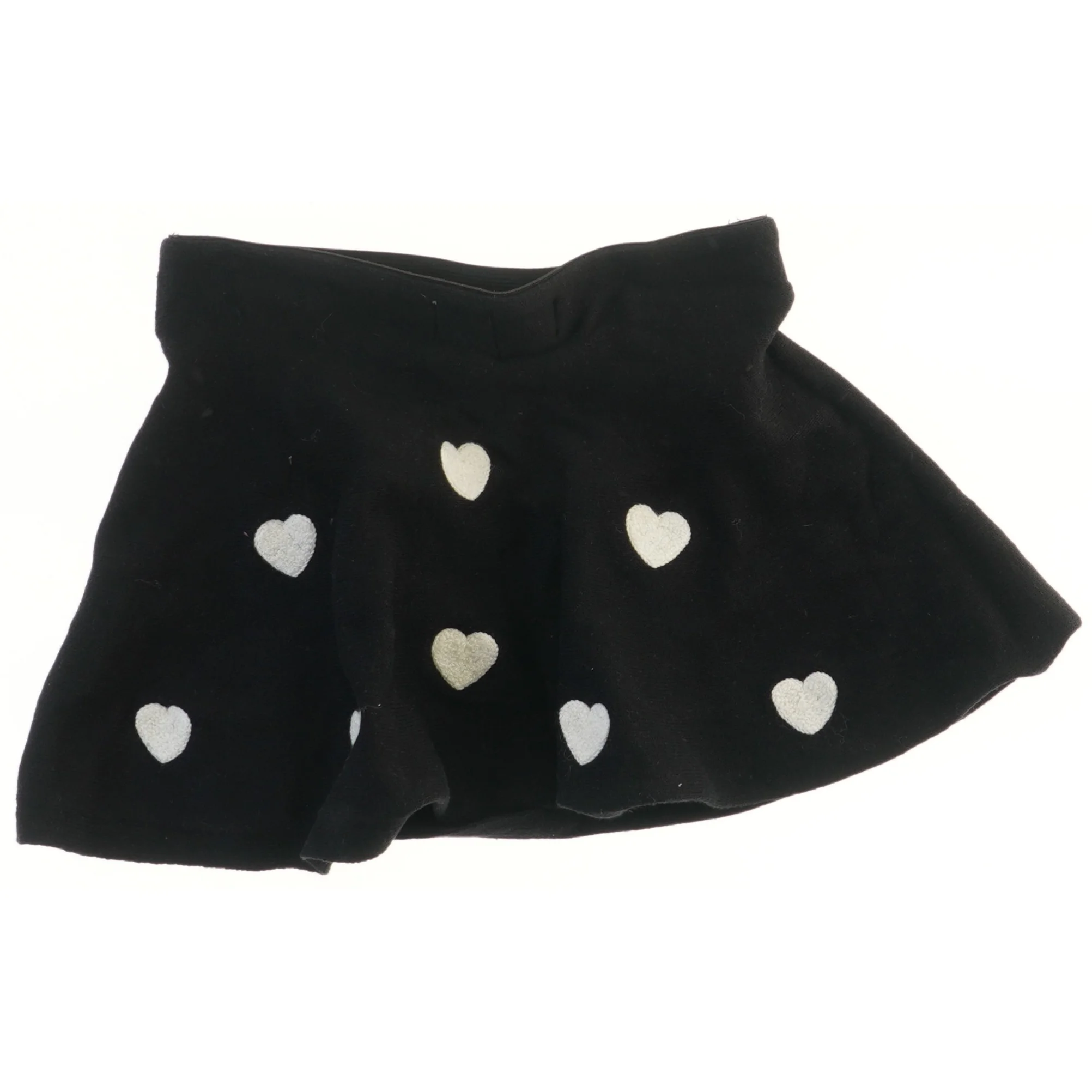 Sort nederdel med hvide hjerter fra H&M (str. 92)