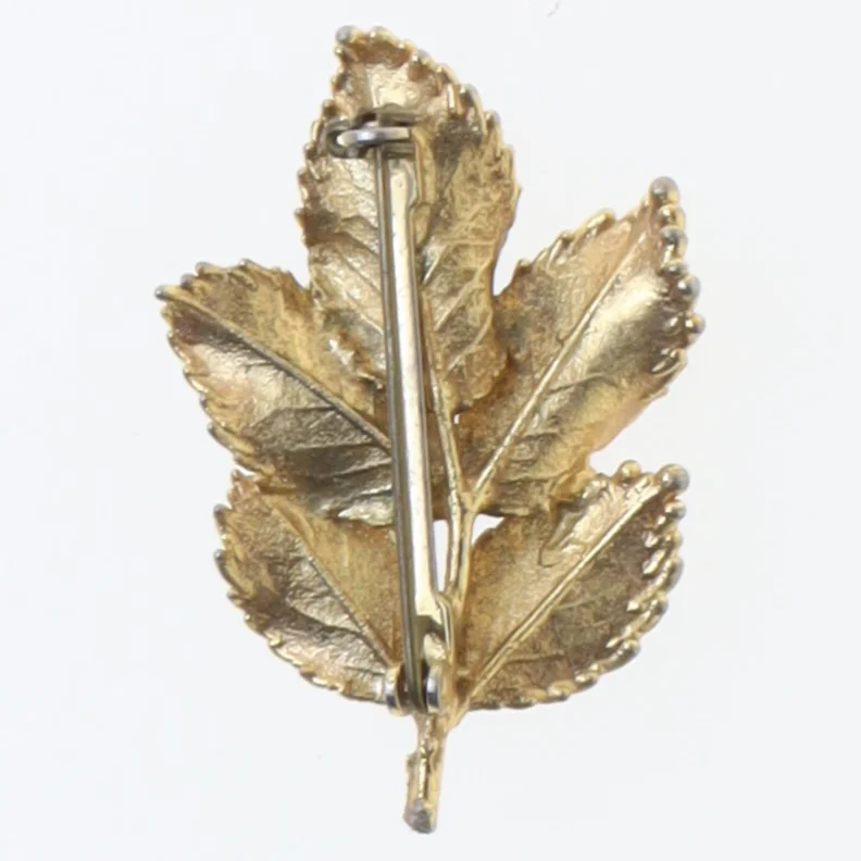 Guld blad broche (str. 4,5 cm)