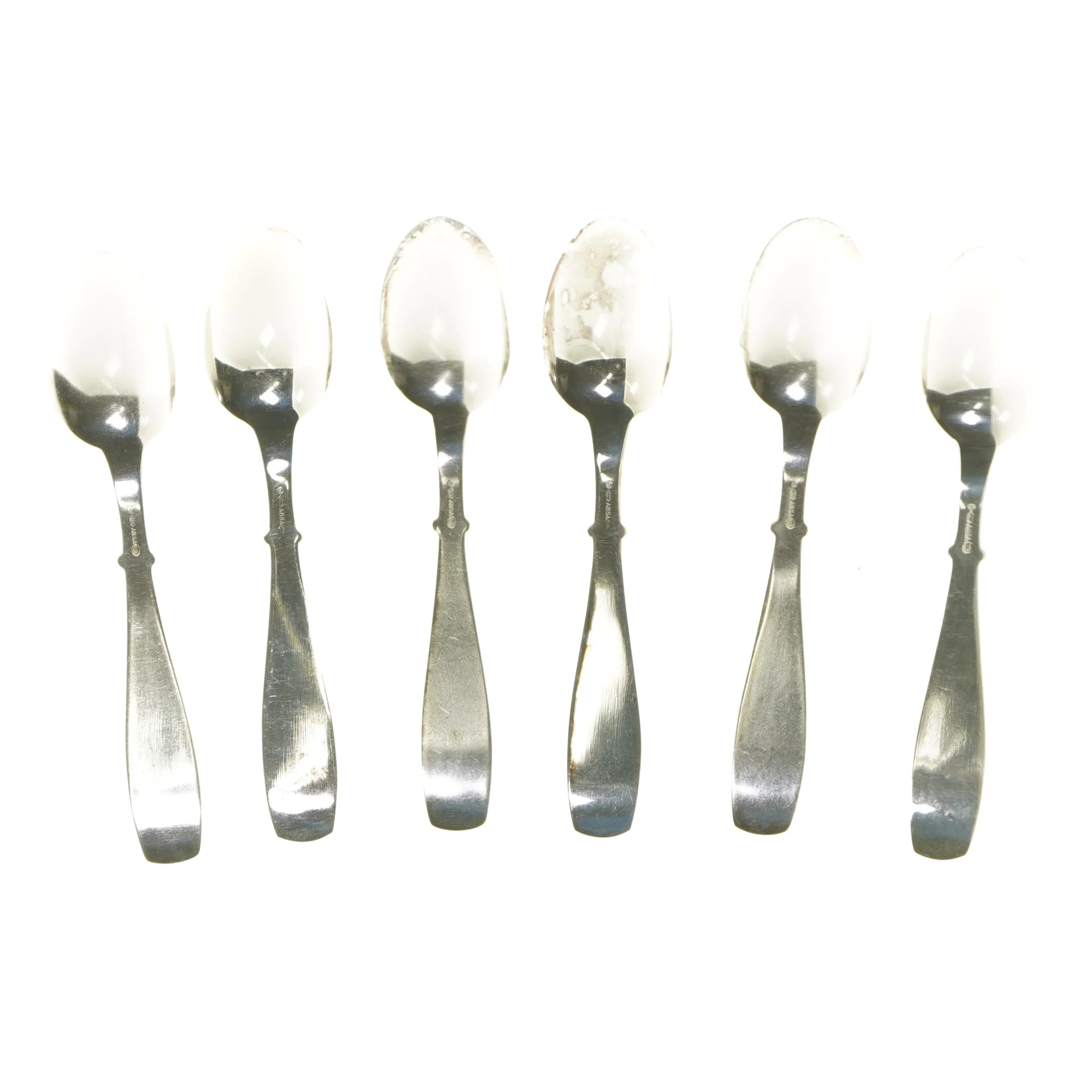Sæt med seks sølvfarvede skeer fra Absa (str. 6 stk 17,5 cm)