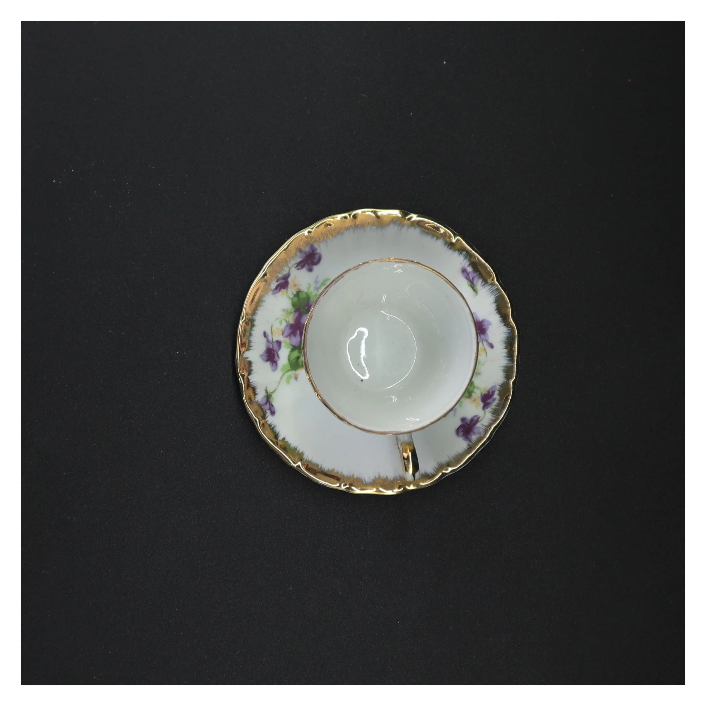 Porcelænste kop og underkop med blomstermotiver fra Lucky (str. 11 x 6 cm)