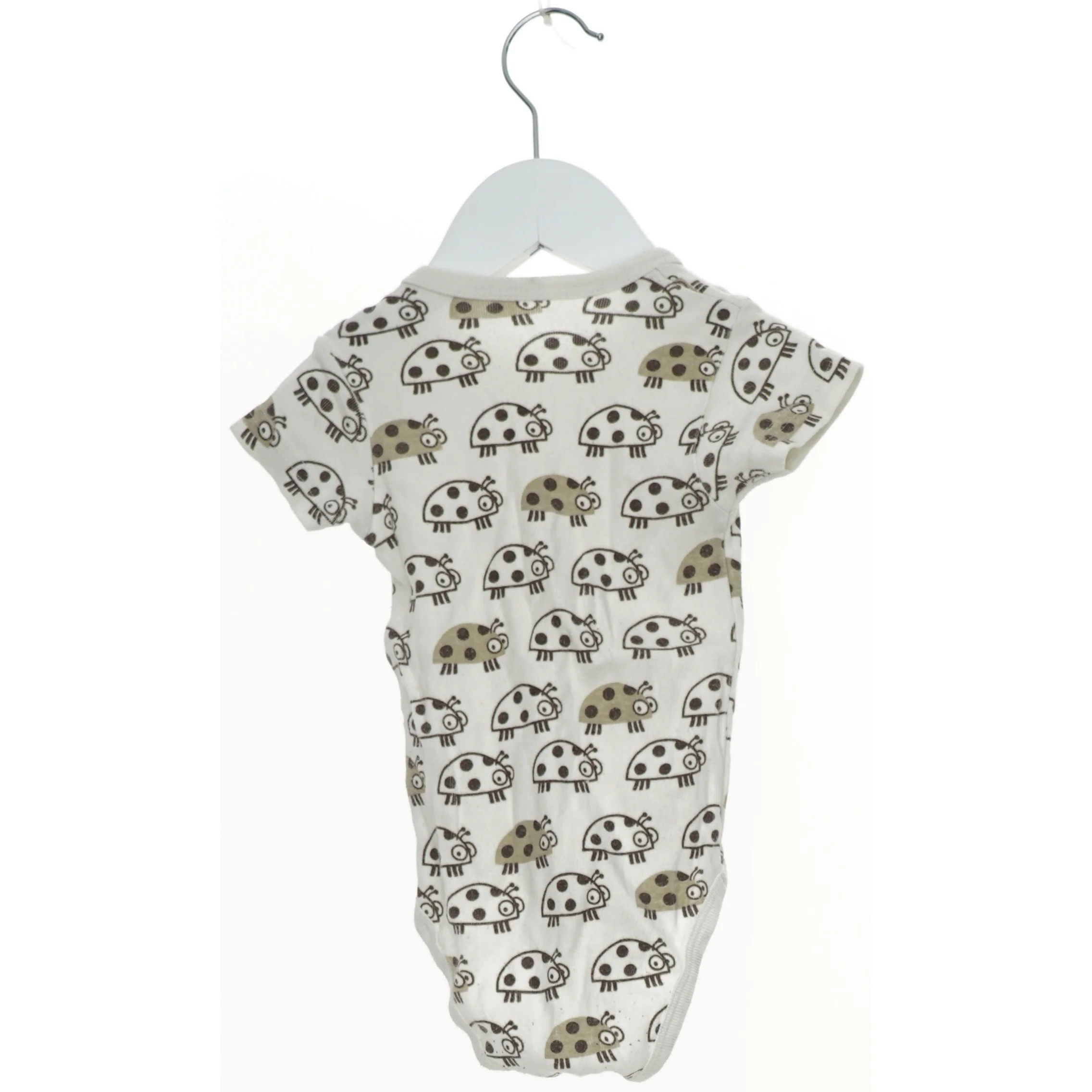 Kortærmet bodystocking med mariehøneprint (str. 74)