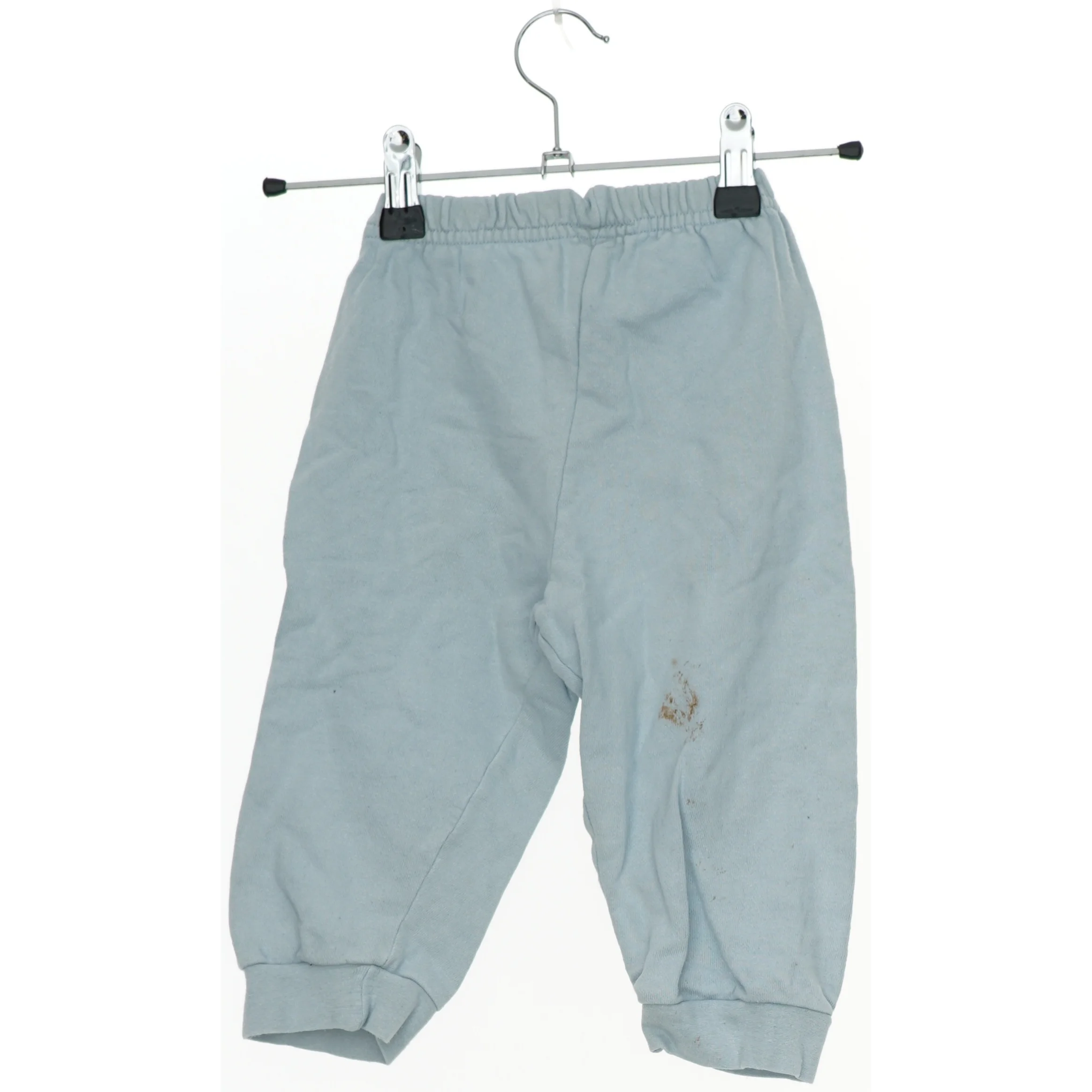 Baby blå bukser med lapper (str. 80)