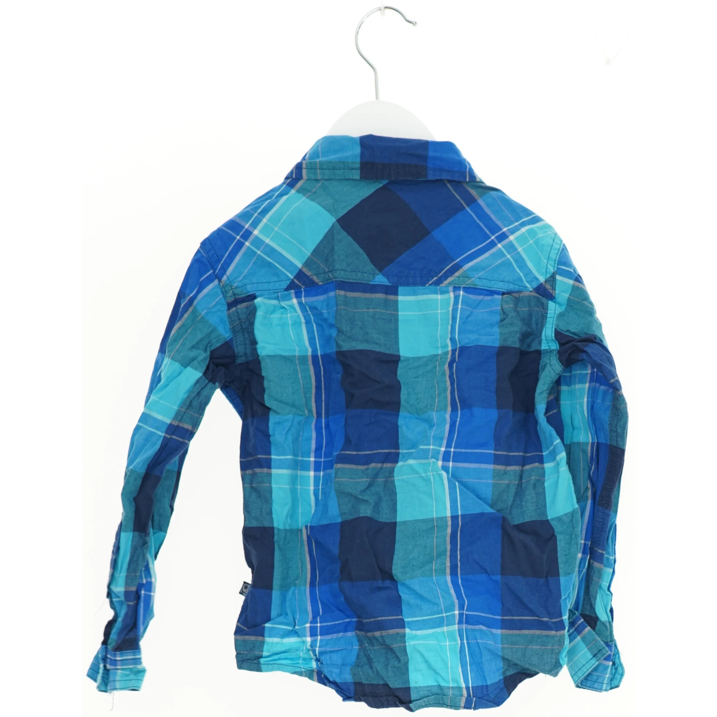 Blå ternet skjorte fra Friends (str. 110)