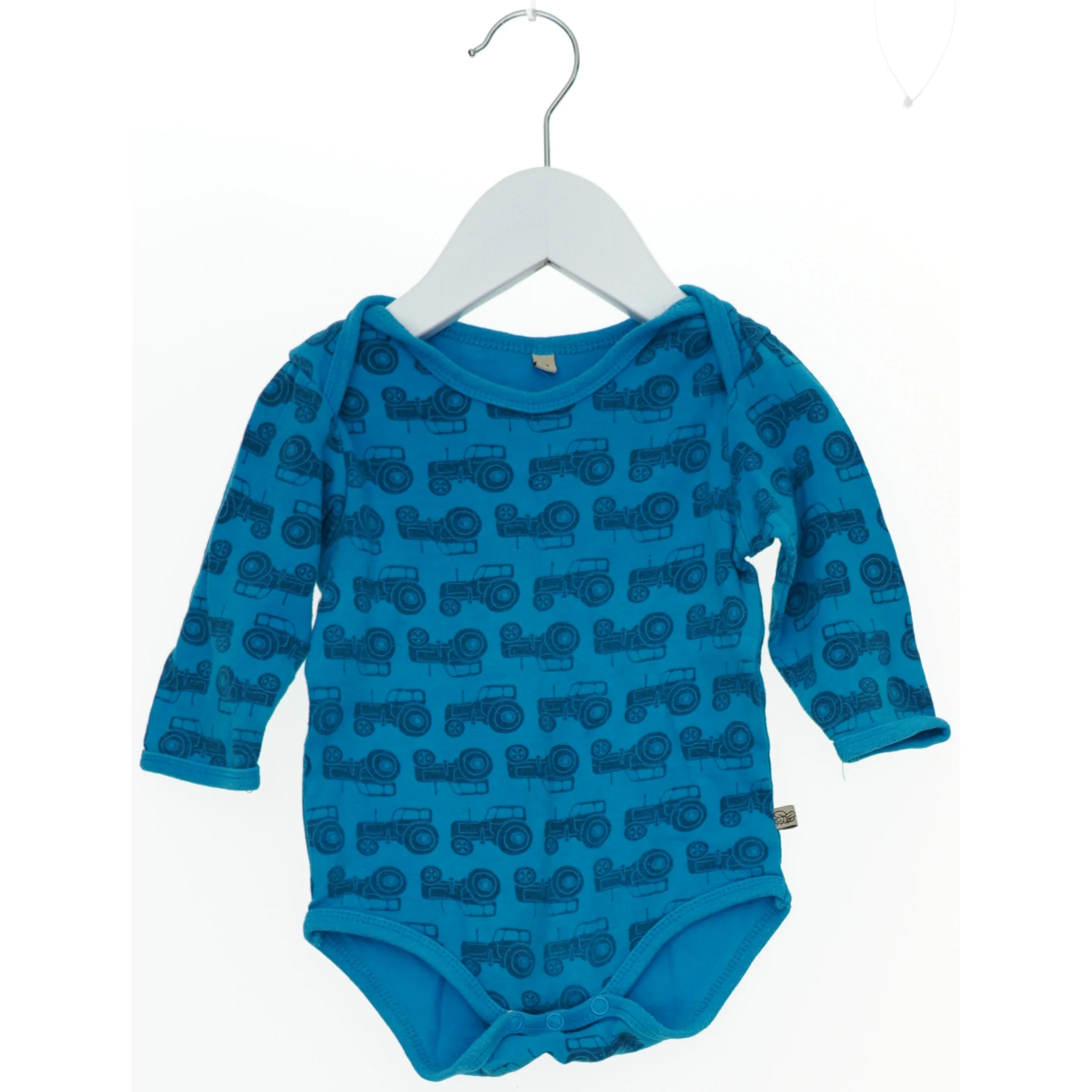 Blå bodystocking med traktorprint (str. 74)