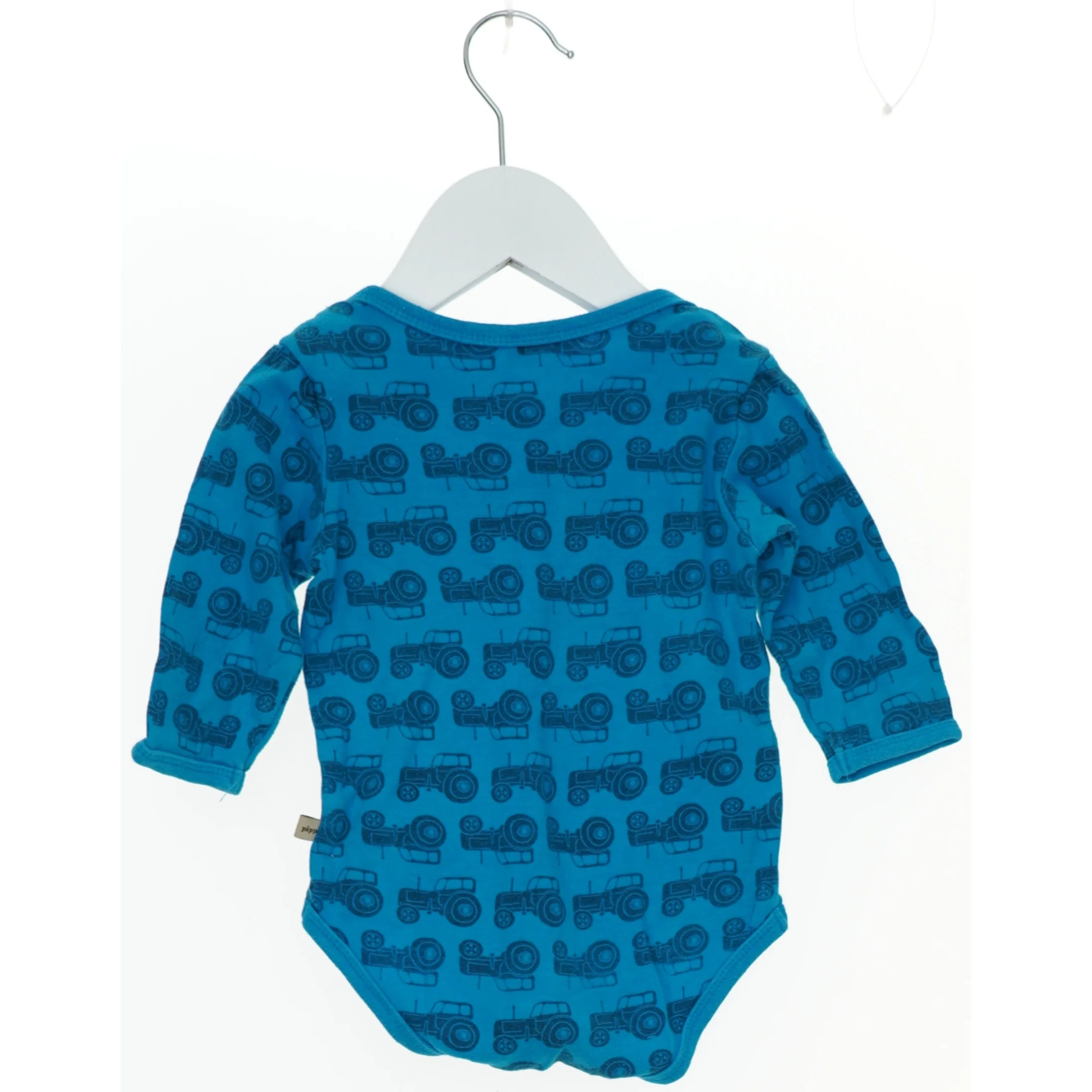 Blå bodystocking med traktorprint (str. 74)