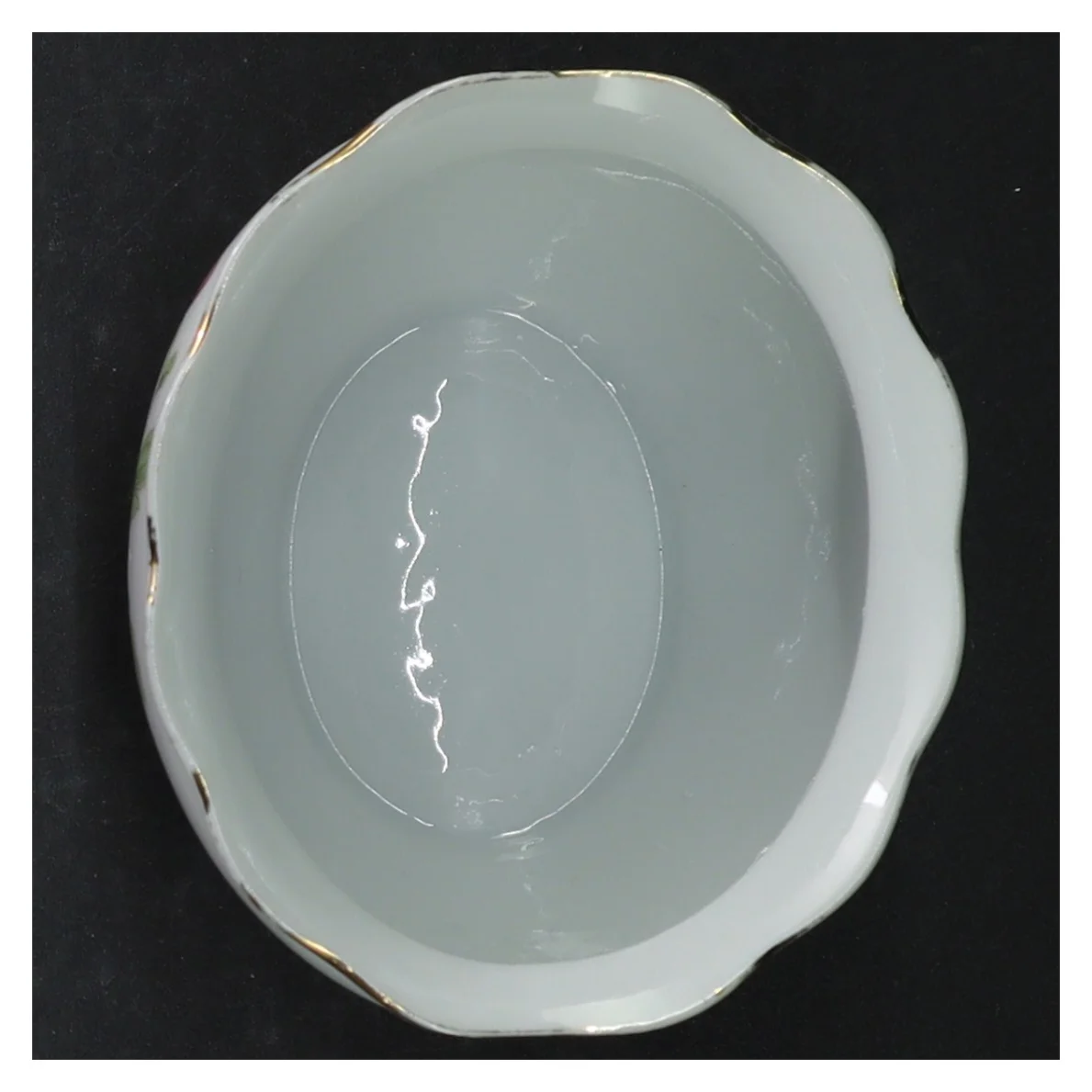 Porcelænsskål med blomstermotiv (str. H. 7 cm. 11 x 9,5 cm)