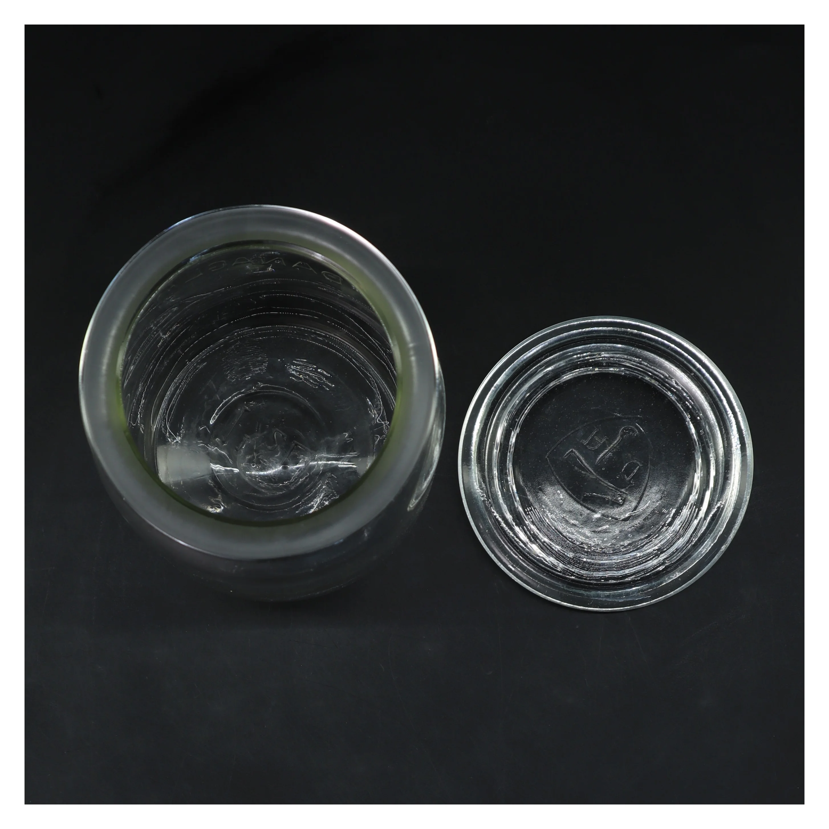 Glaskrukke med låg fra Danaglas (str. Ø 11,5 cm længde 17,5 cm)