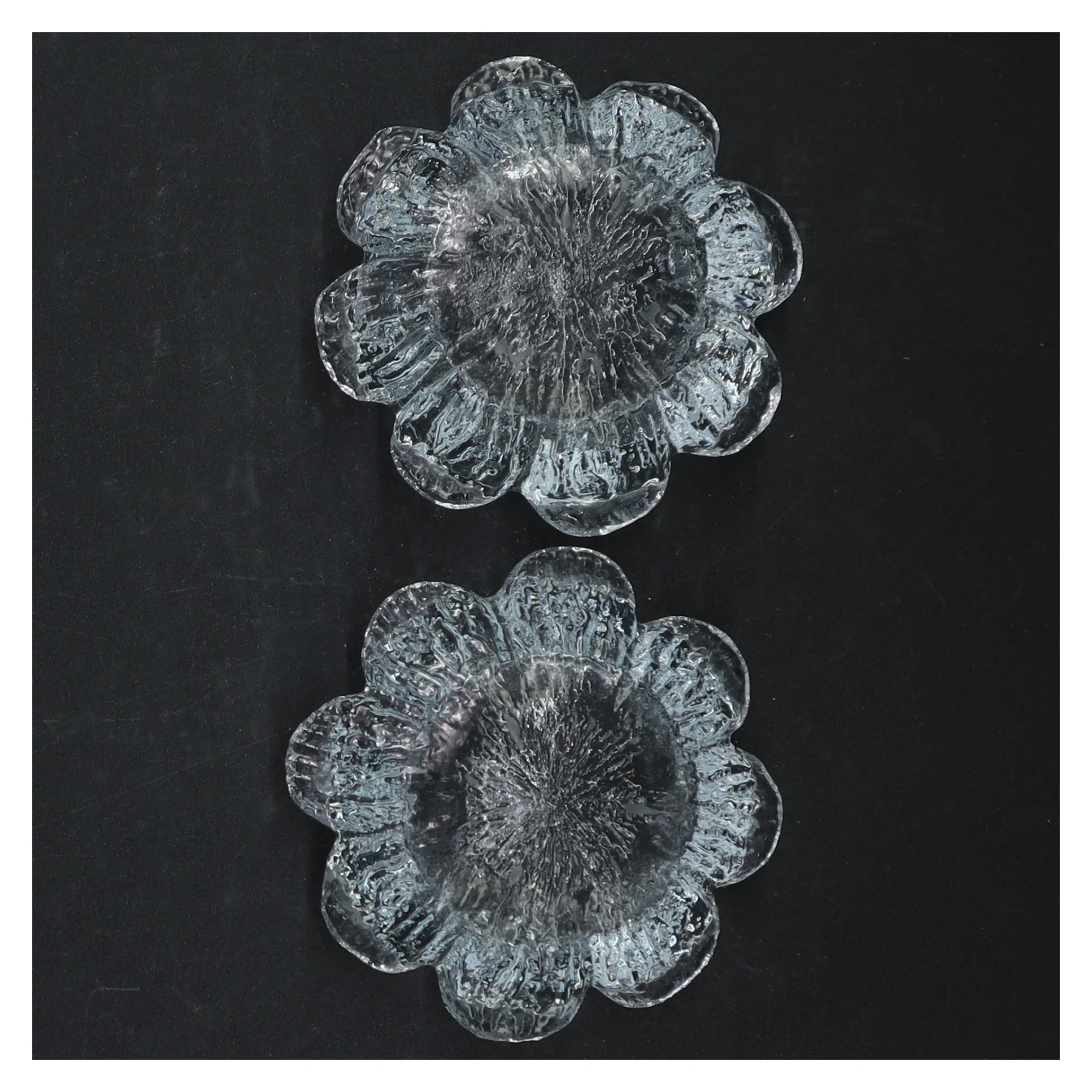 Glas fyrfadsstager i blomsterform