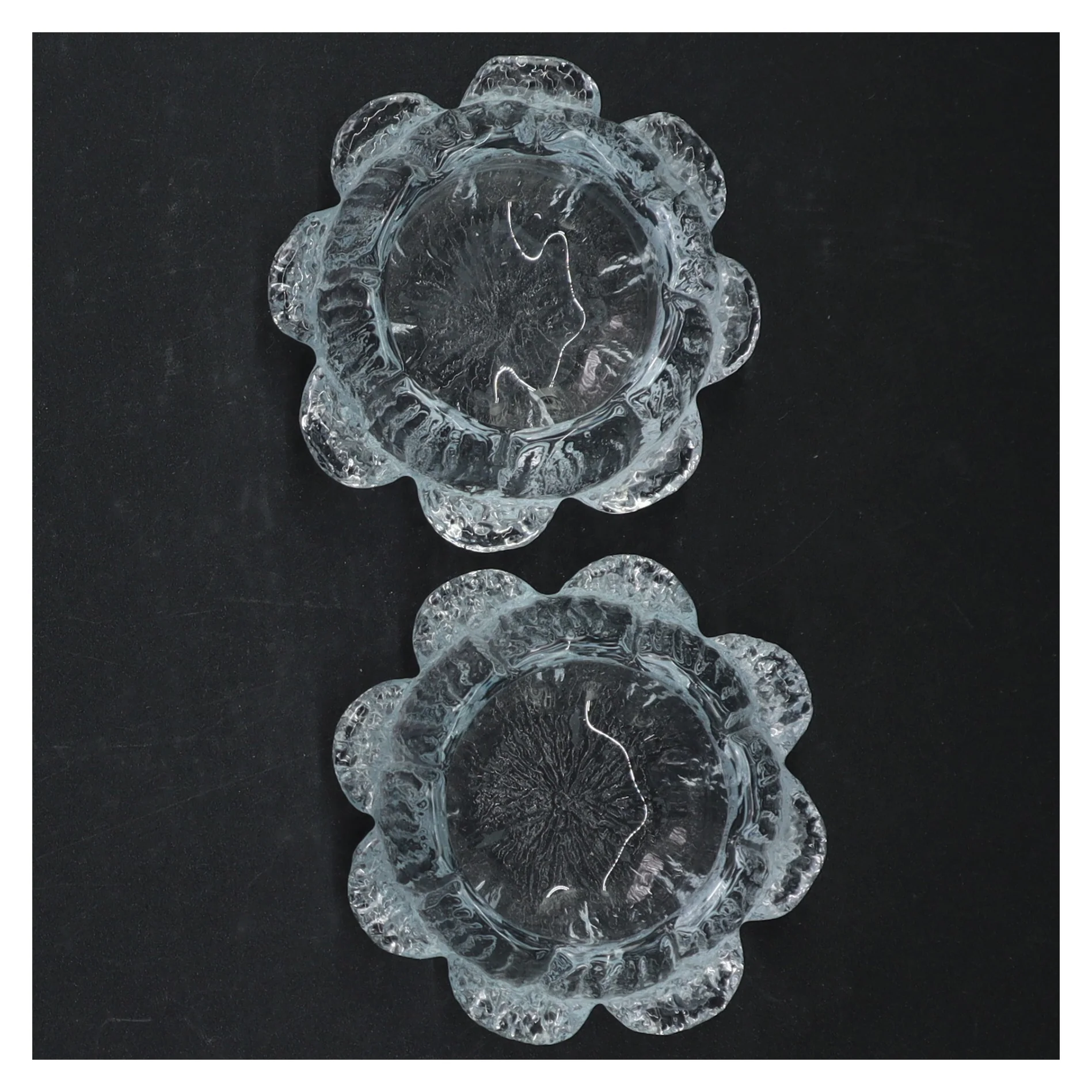 Glas fyrfadsstager i blomsterform