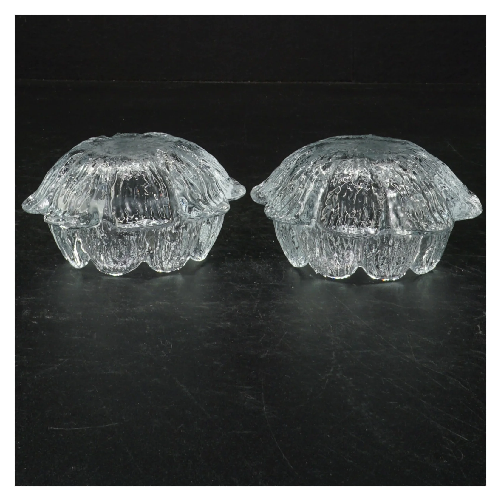 Glas fyrfadsstager i blomsterform