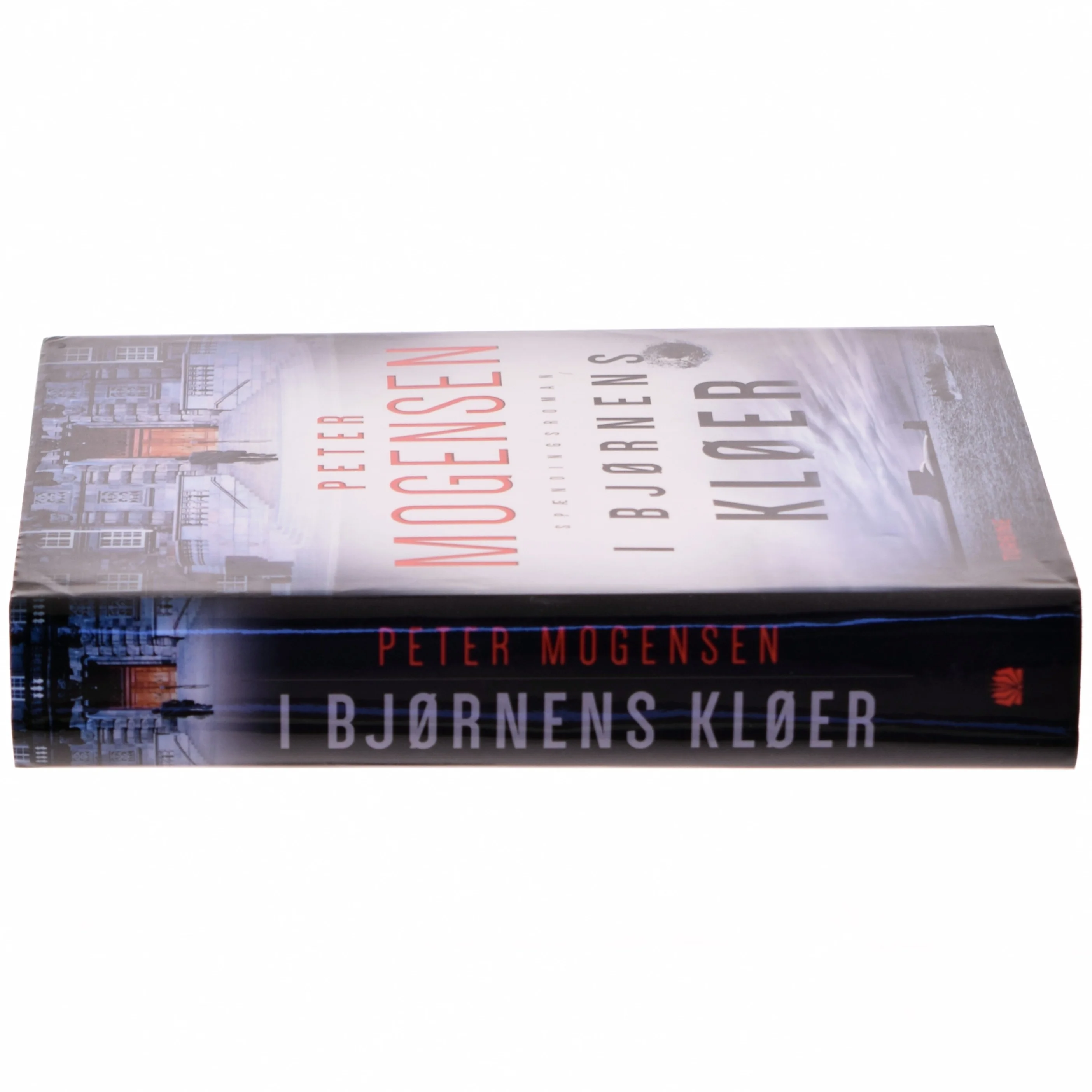 I bjørnens kløer : spændingsroman af Peter Mogensen (f. 1965-01-06) (Bog)