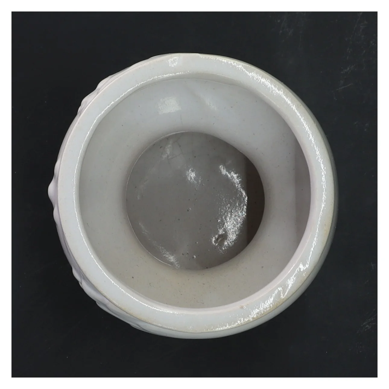 Hvid keramisk vase med ansigtsmotiv (str. Ø 9 cm længde 12 cm)fra w. Germany