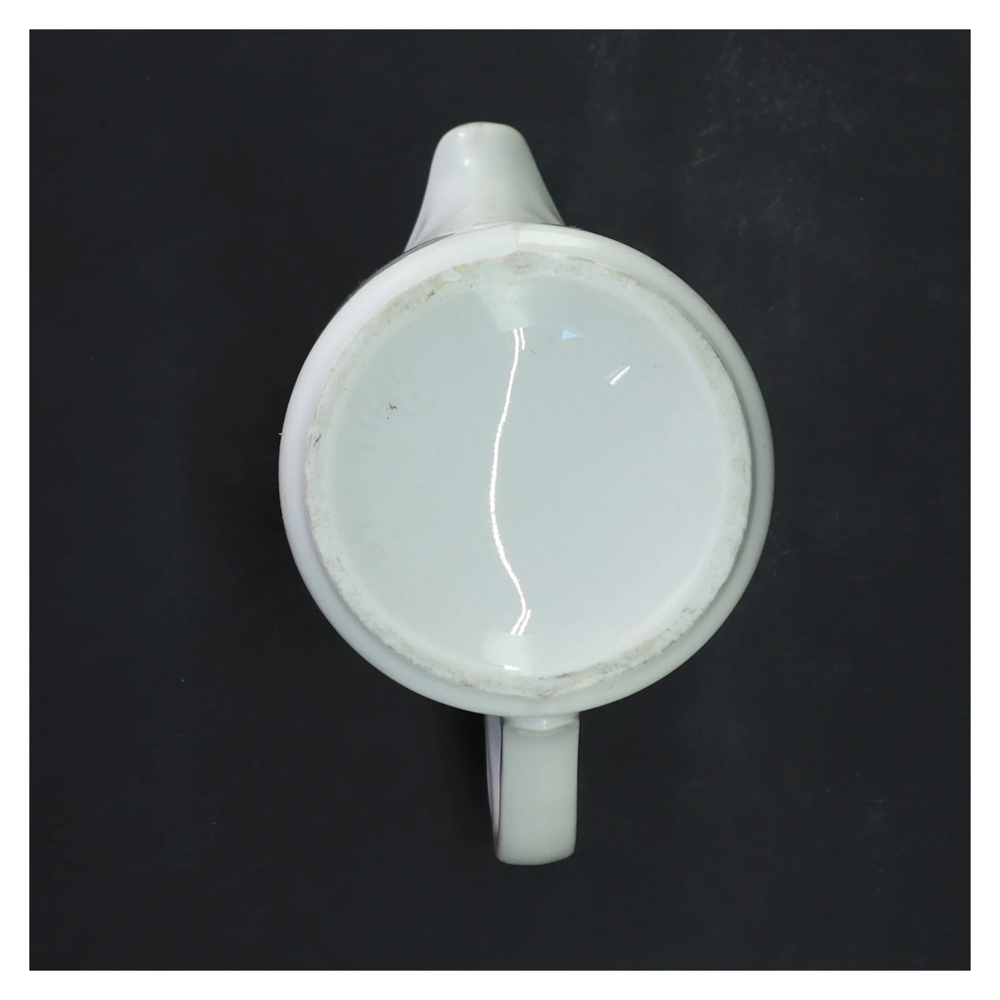 Hvid kande med blomstermønster (str. 16x9,5 cm)