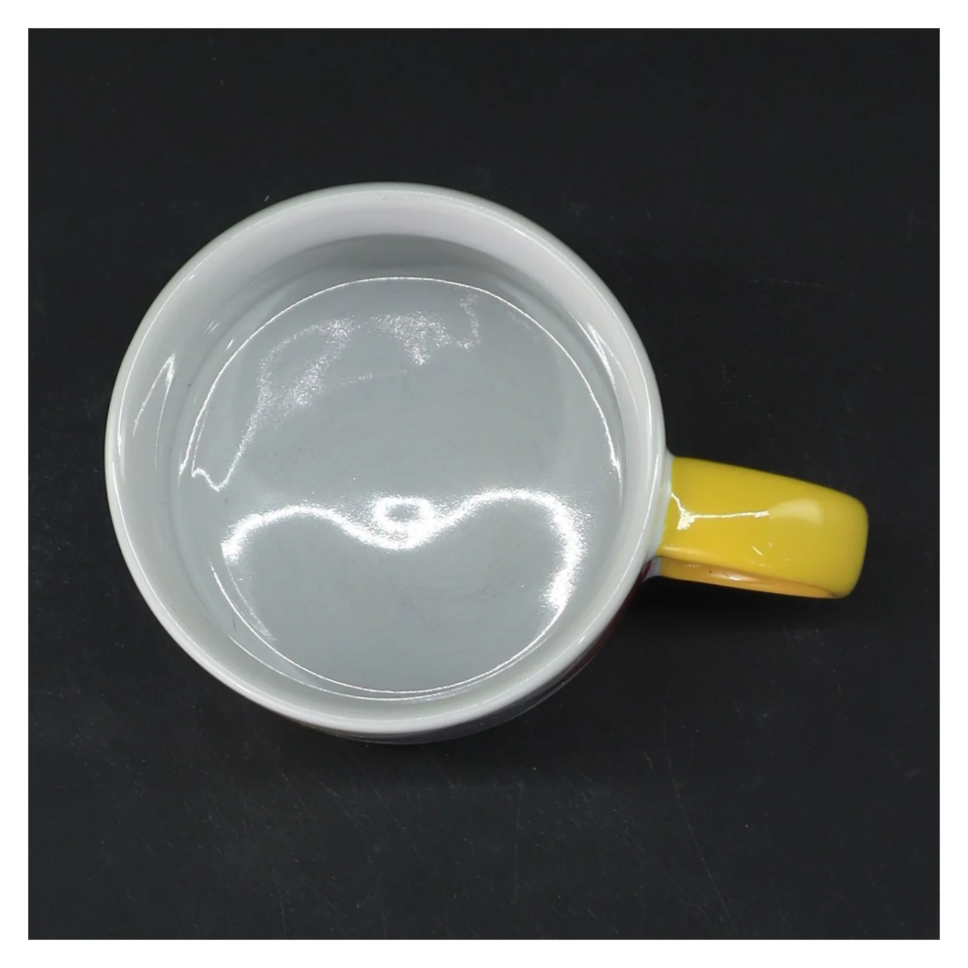 Farverig krus med diamantmønster fra Jansen Co (str. Ø 8 cm længde 7 cm)