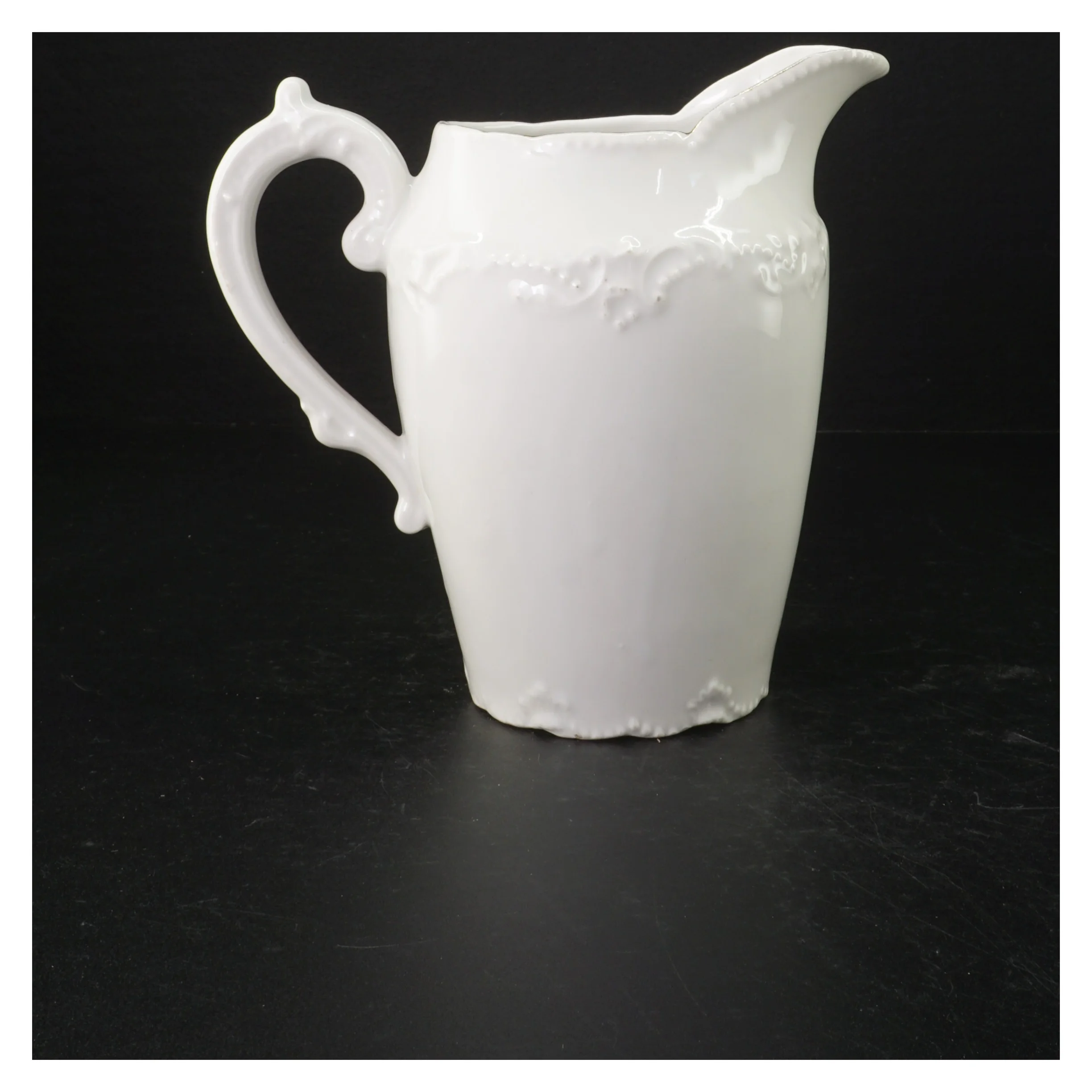 Porcelænskande med blomstermotiv