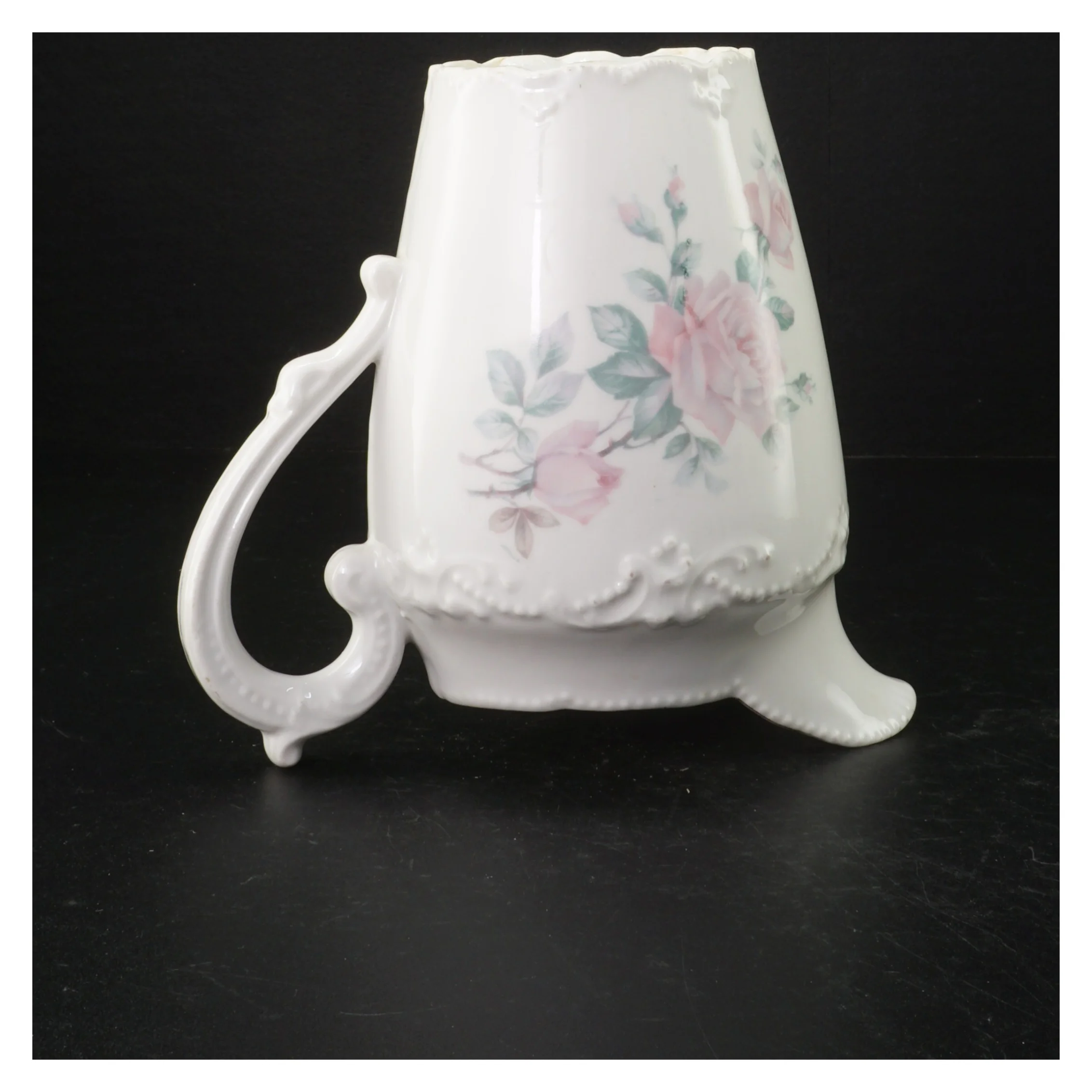 Porcelænskande med blomstermotiv